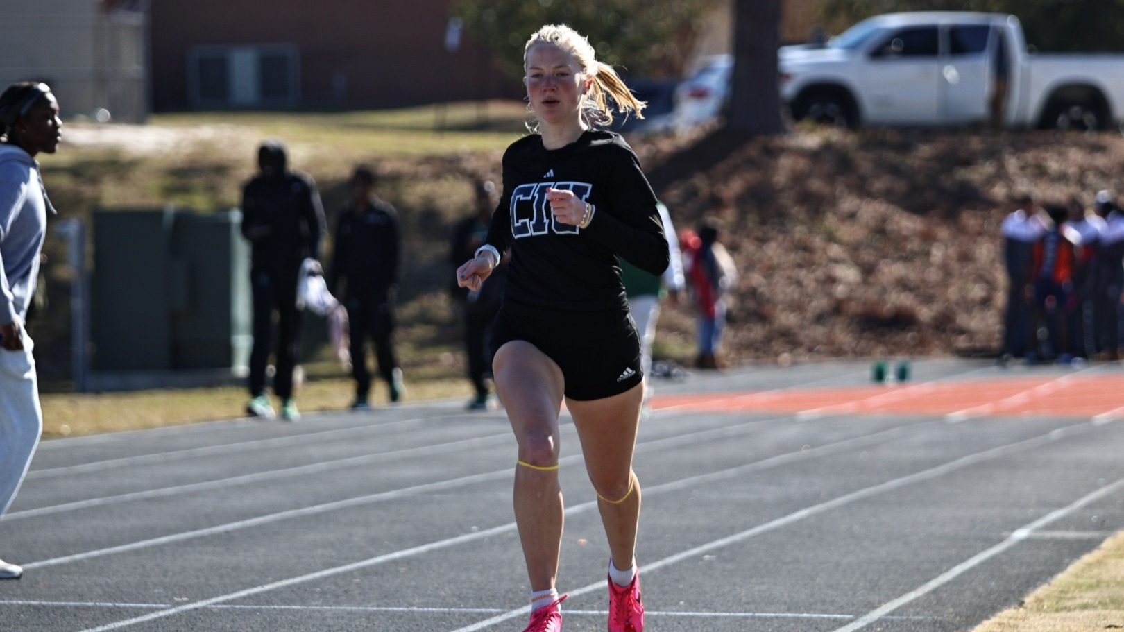 Elizabeth Gustafson runs on the track for CIU