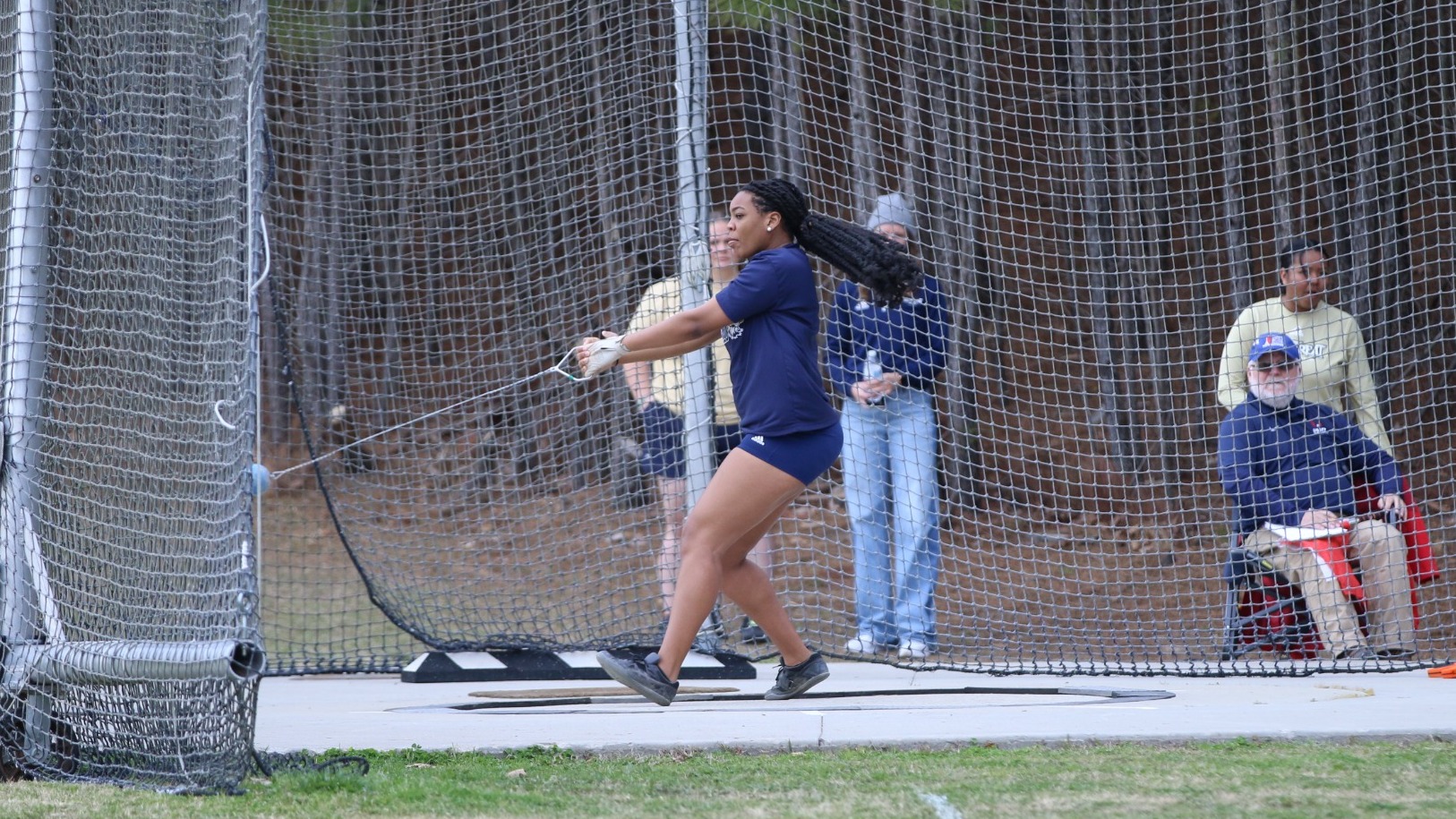 Coral Curry competes in the hammer throw