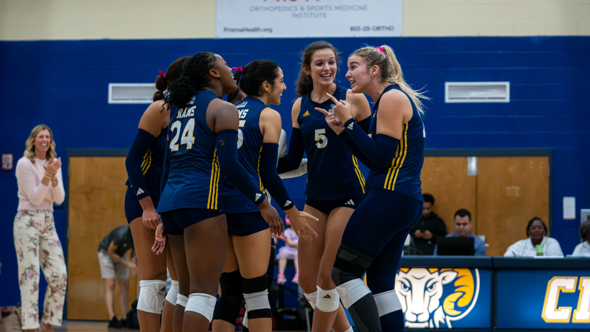 CIU volleyball celebrates a kill