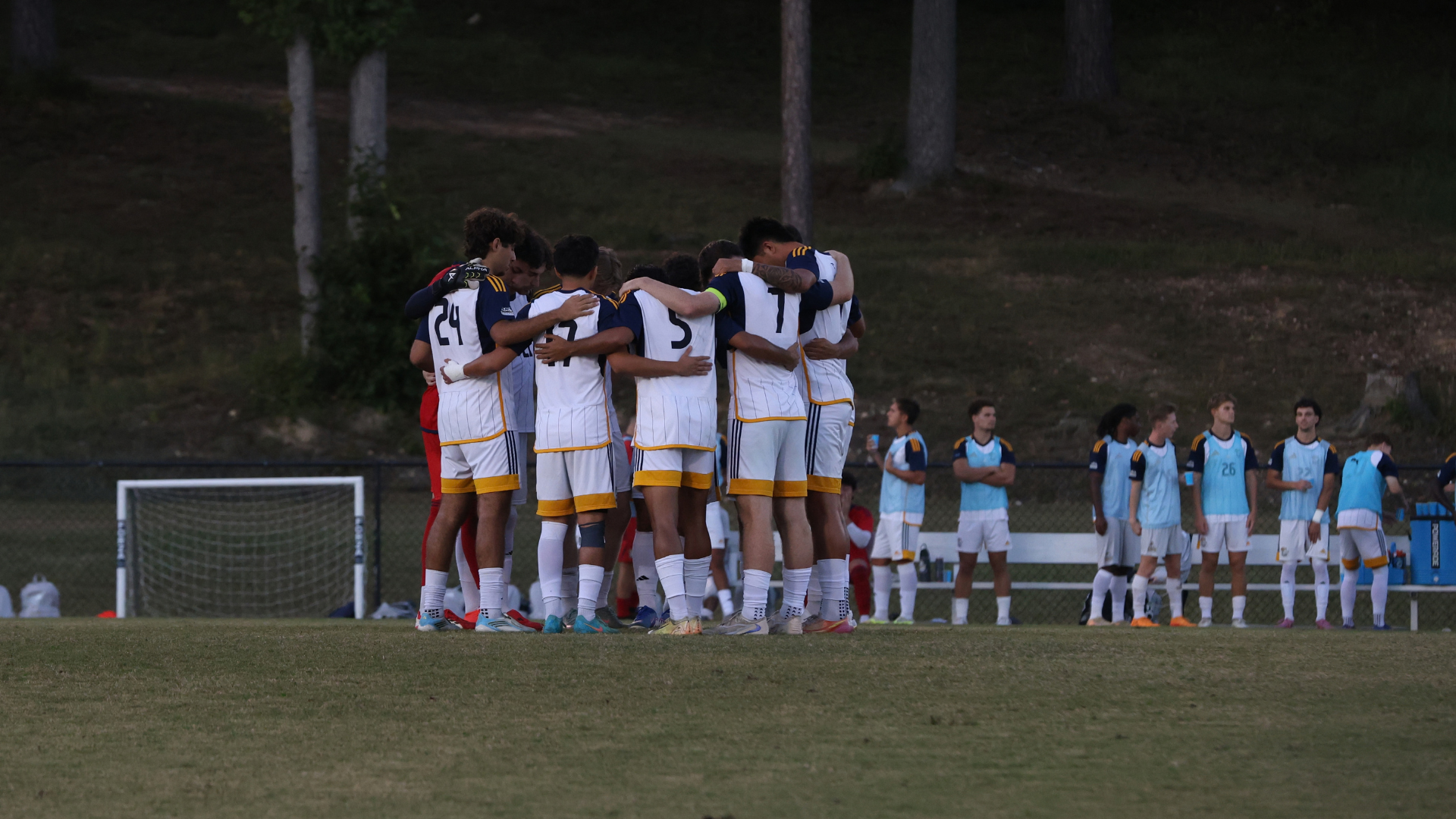 CIU men's soccer huddles 