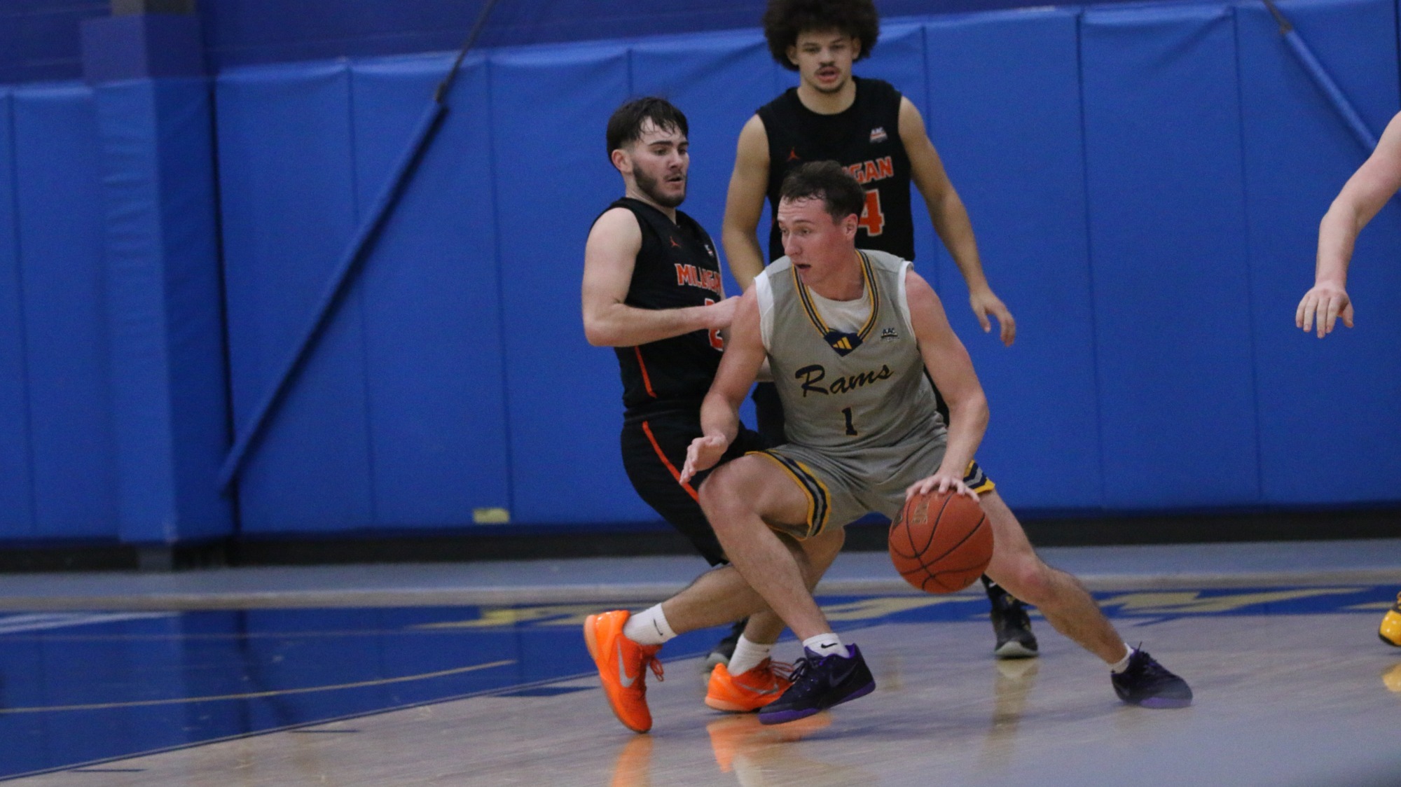 Jackson Inman fights off an Milligan 