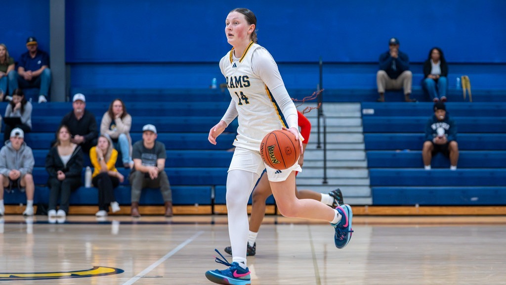 Katie Johnson brings the ball down the court