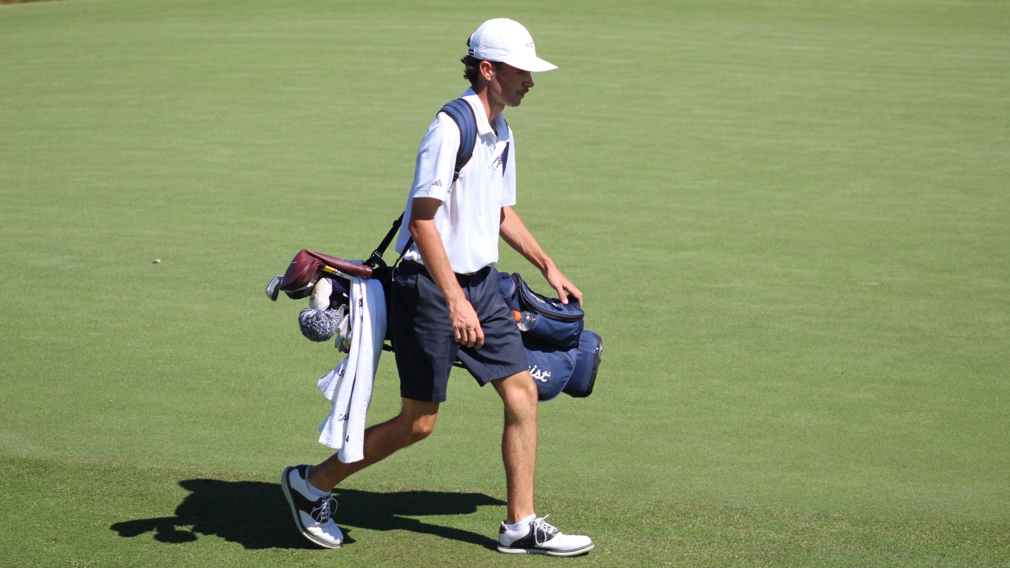 Luke Hammnond carries his bag