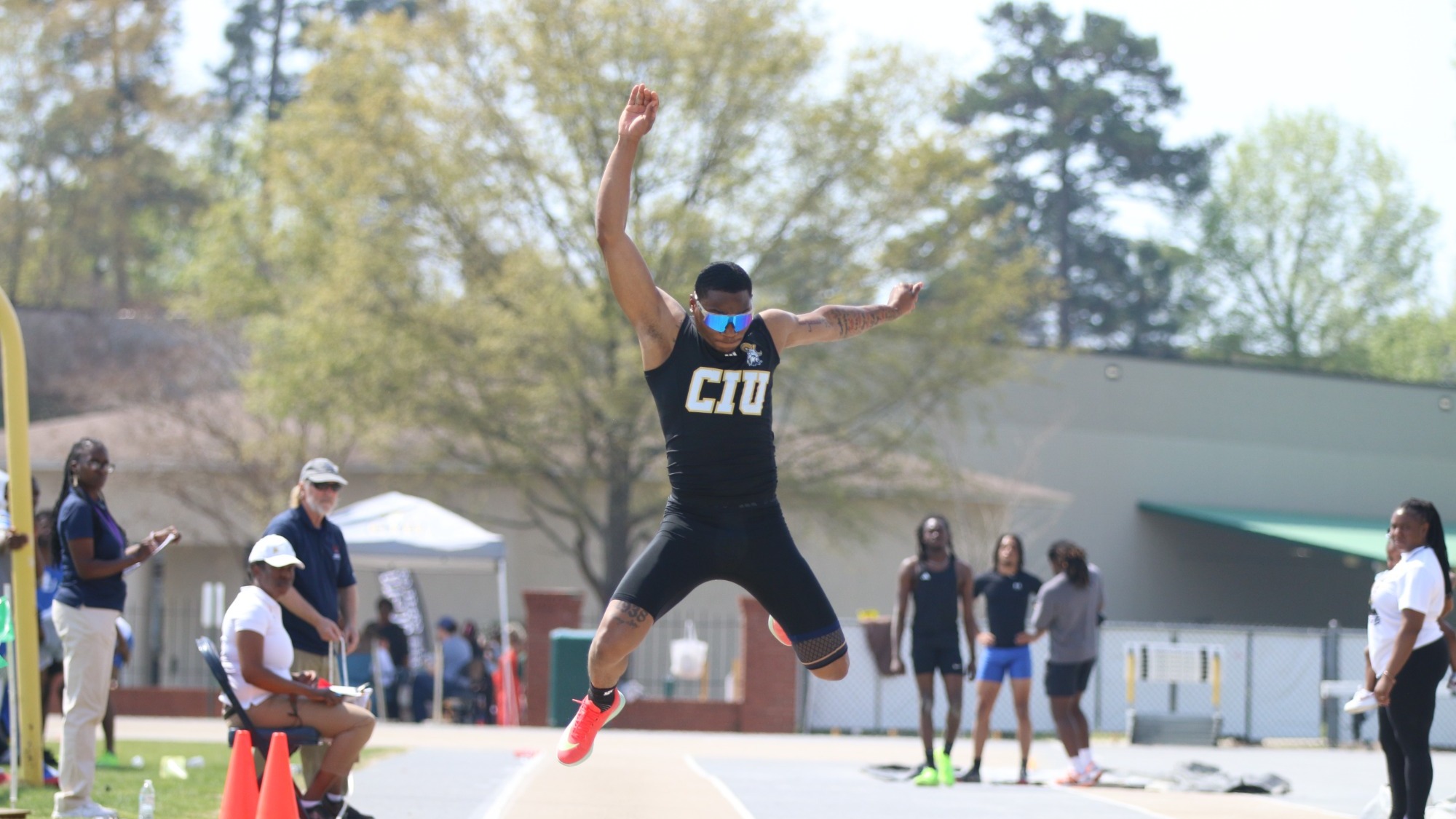 Elijah Seawright competes in the triple jump
