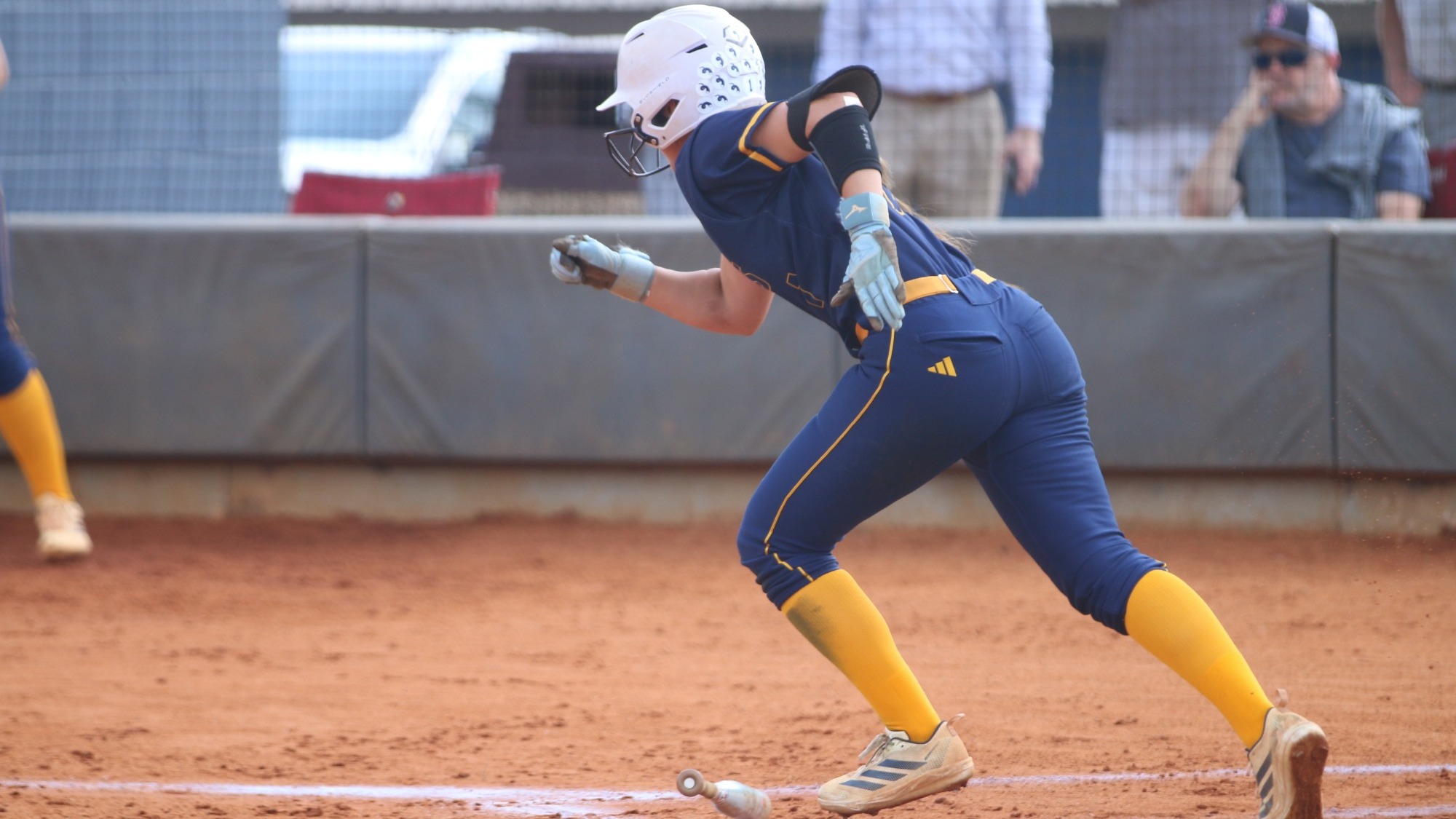 Abby Guthrie runs out of the batter's box