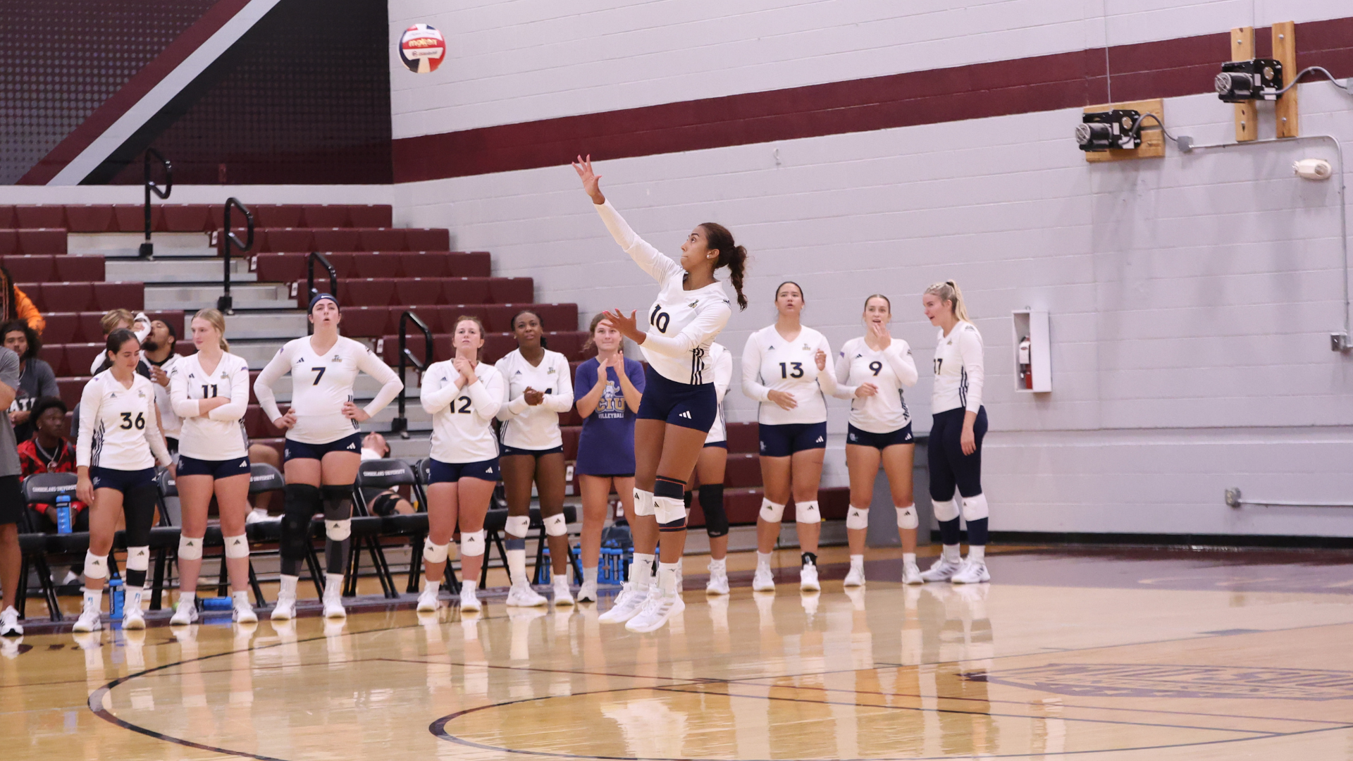 Ashlee Gomes serves for CIU
