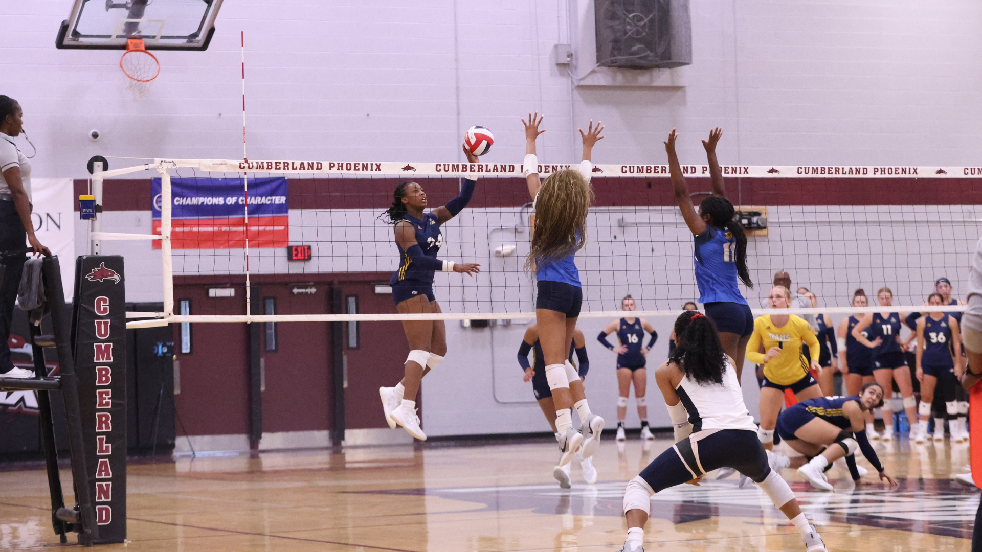 Zcearia James attacks the defense for CIU volleyball