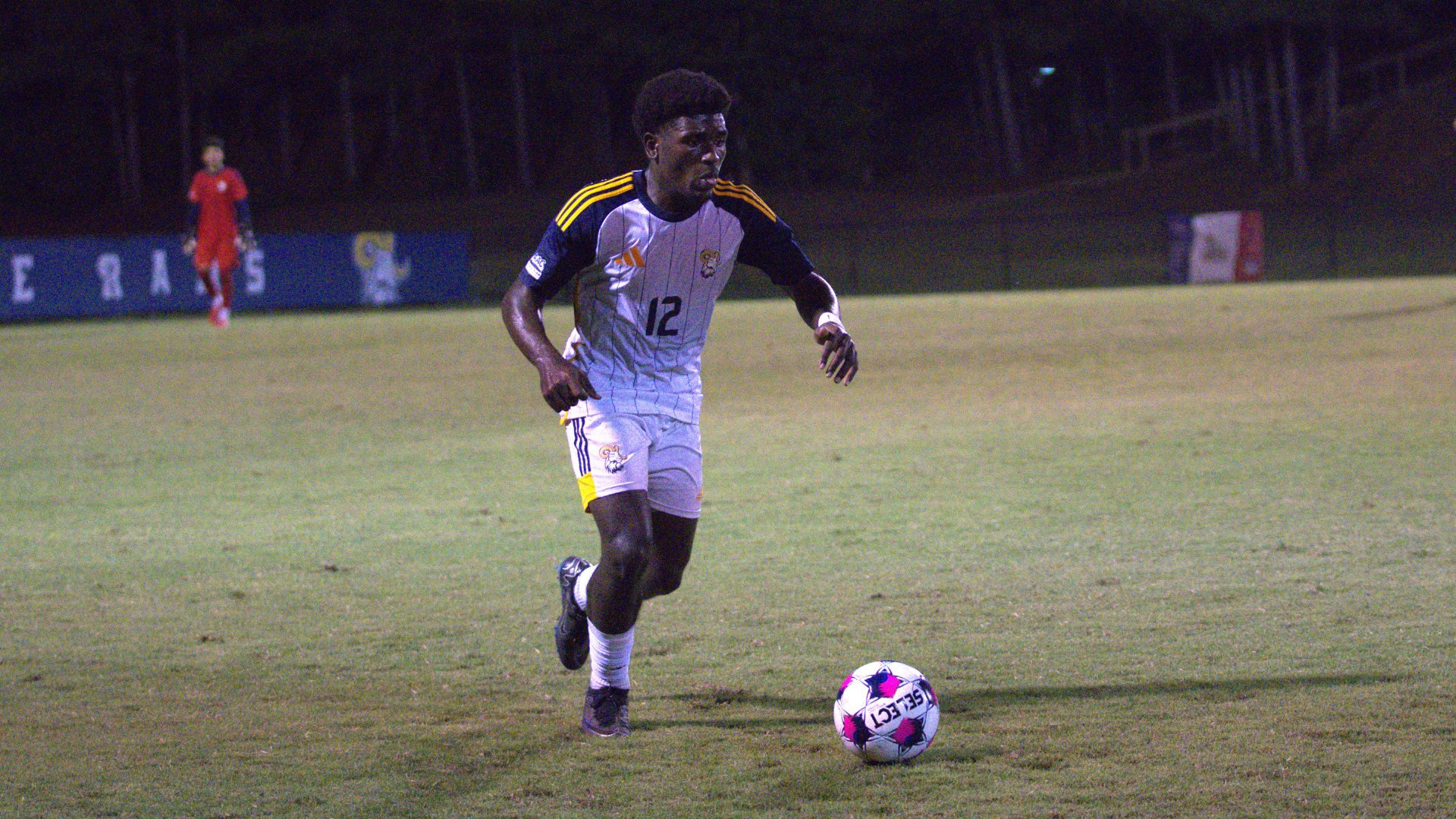 Josh Bell dribbles for CIU