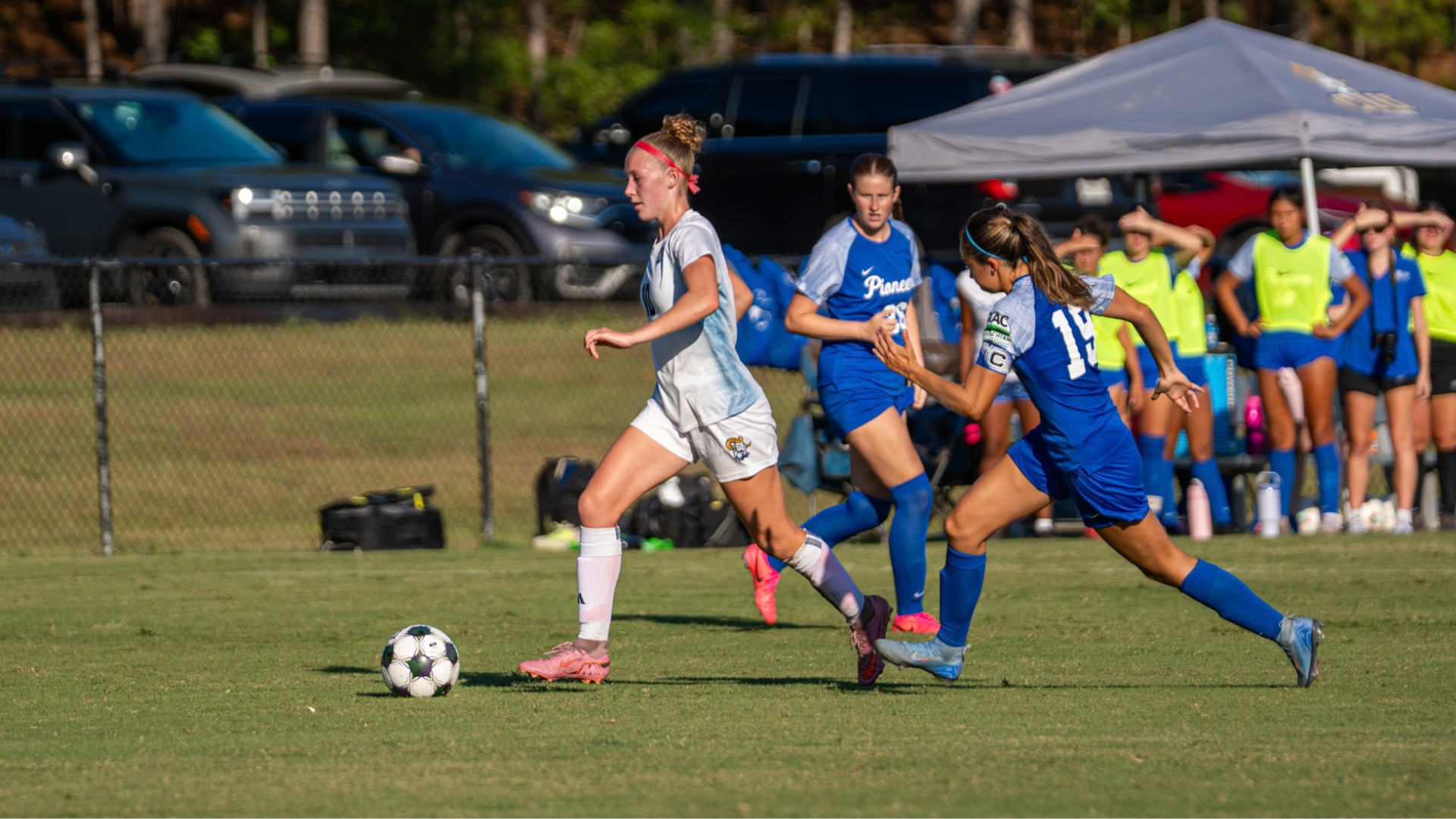 Lucy Jackson brings the ball down field for CIU soccer