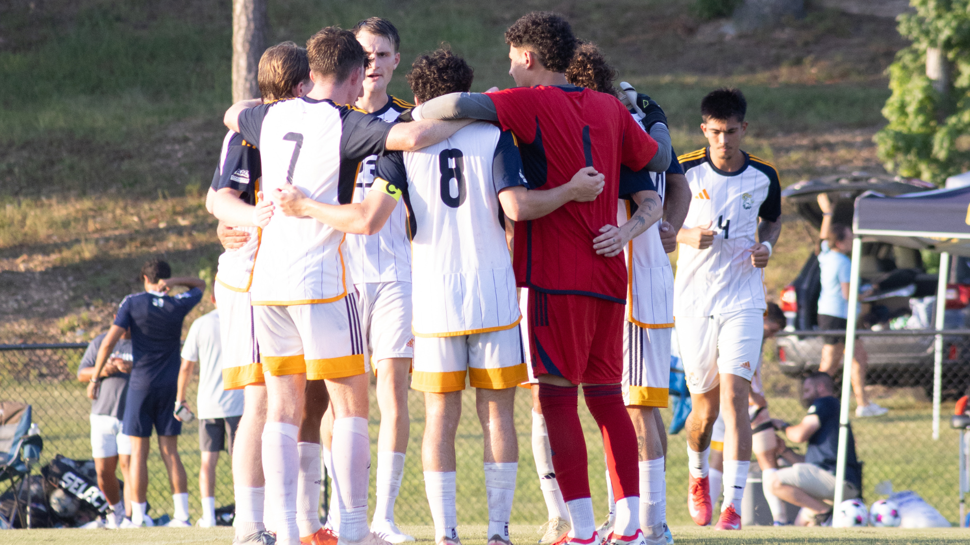 CIU soccer huddle