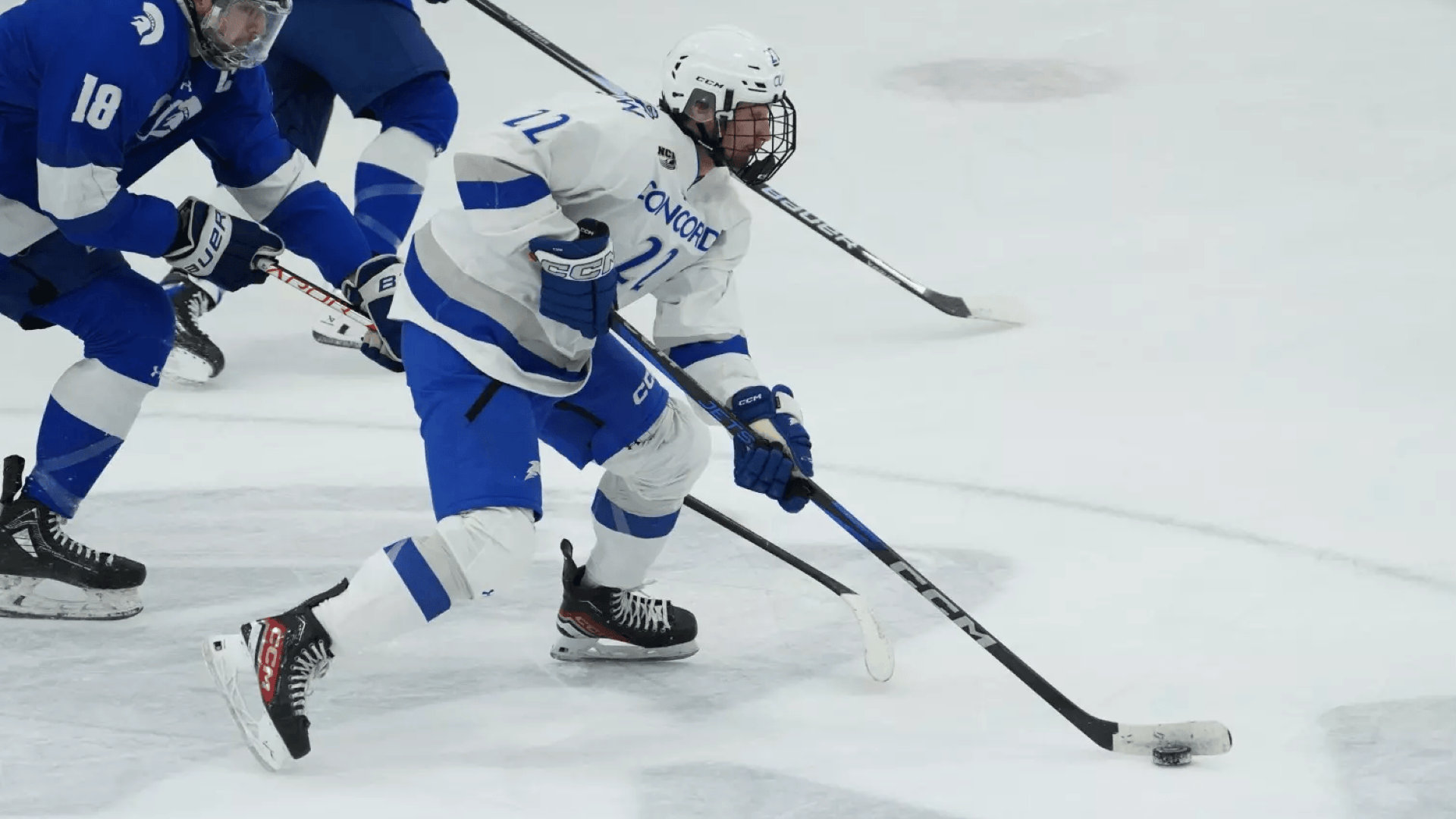Evan Forrest with the puck.