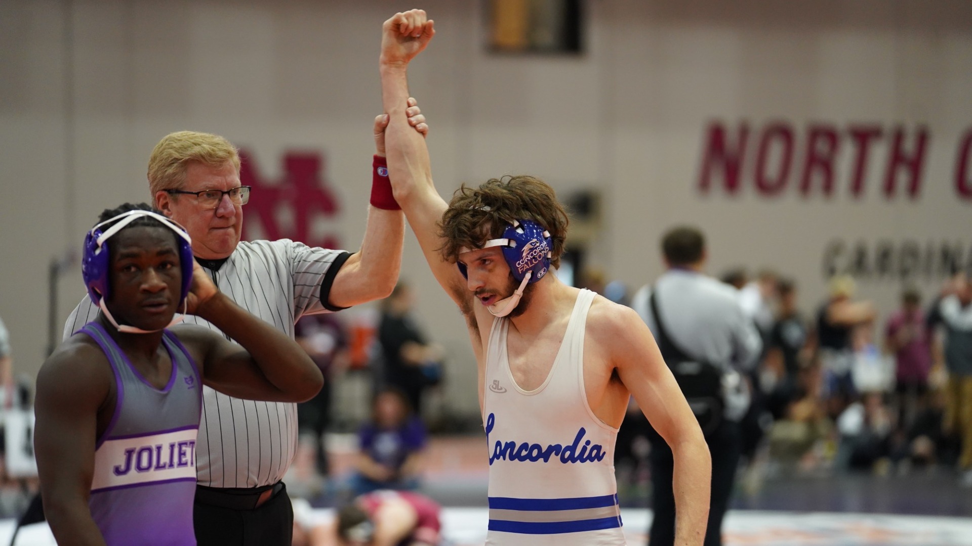 Anatacio Martinez being declared a winner after a bout.