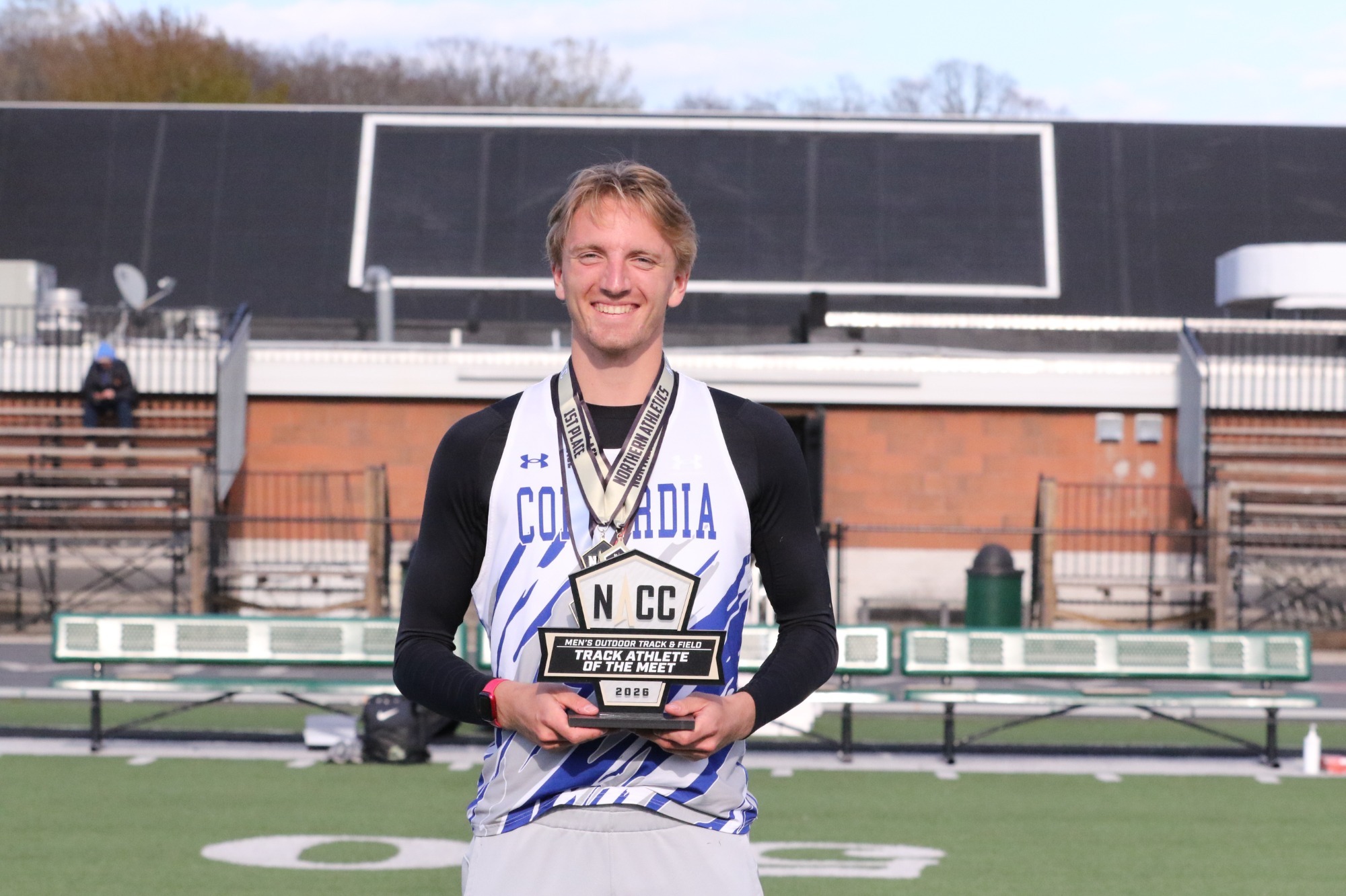 Wendland holding a trophy