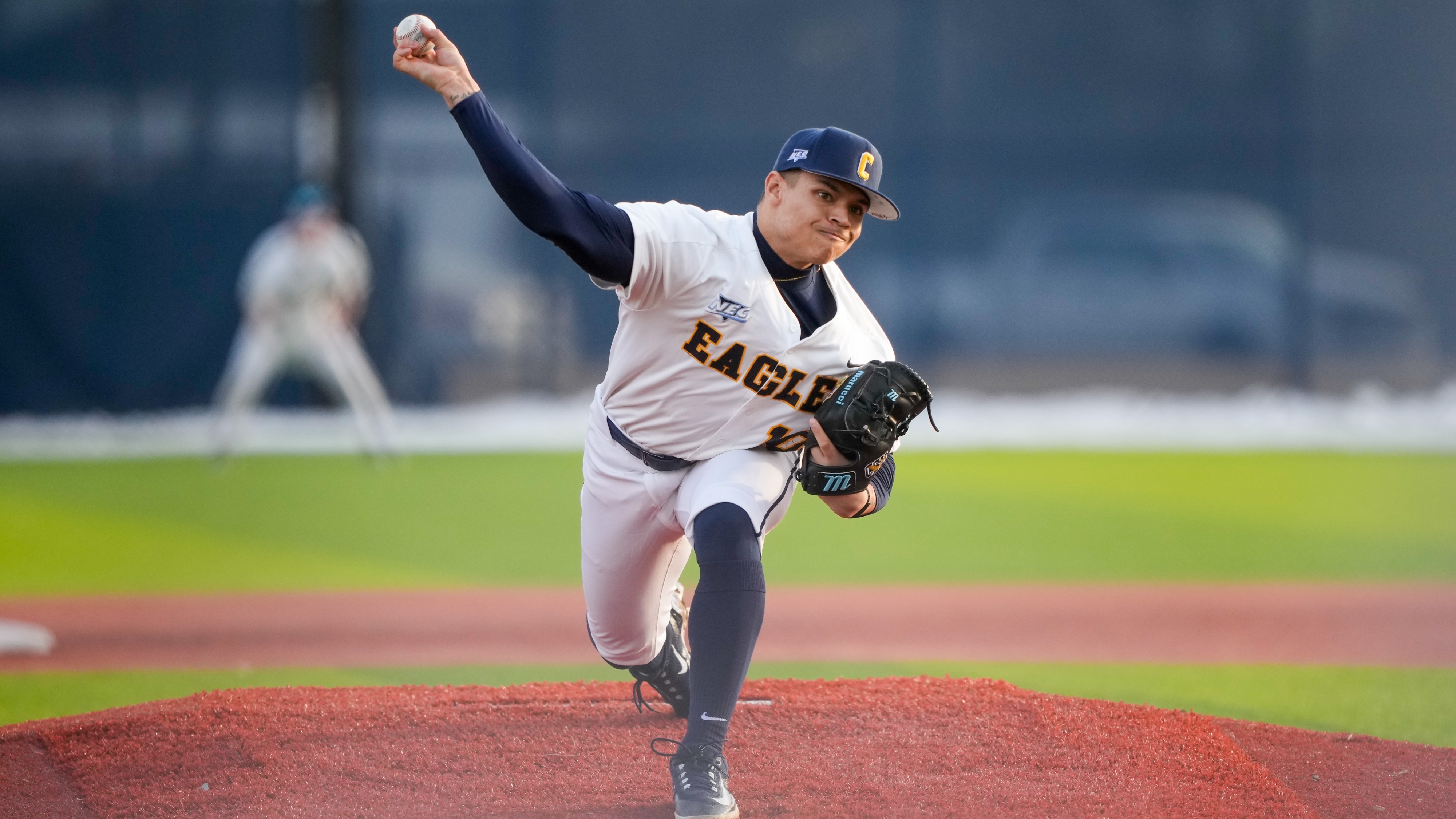 Nicco Holland delivers pitch vs Mount St. Mary's in season opener