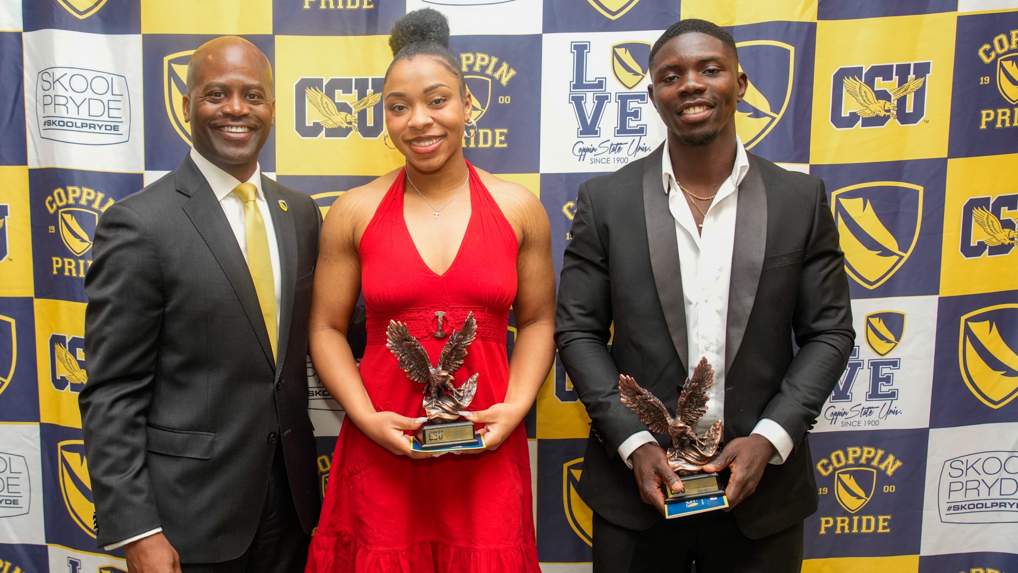 President Jenkins with 2026 Eagle Award Winners TaKenya Stafford and Solomon Hammond