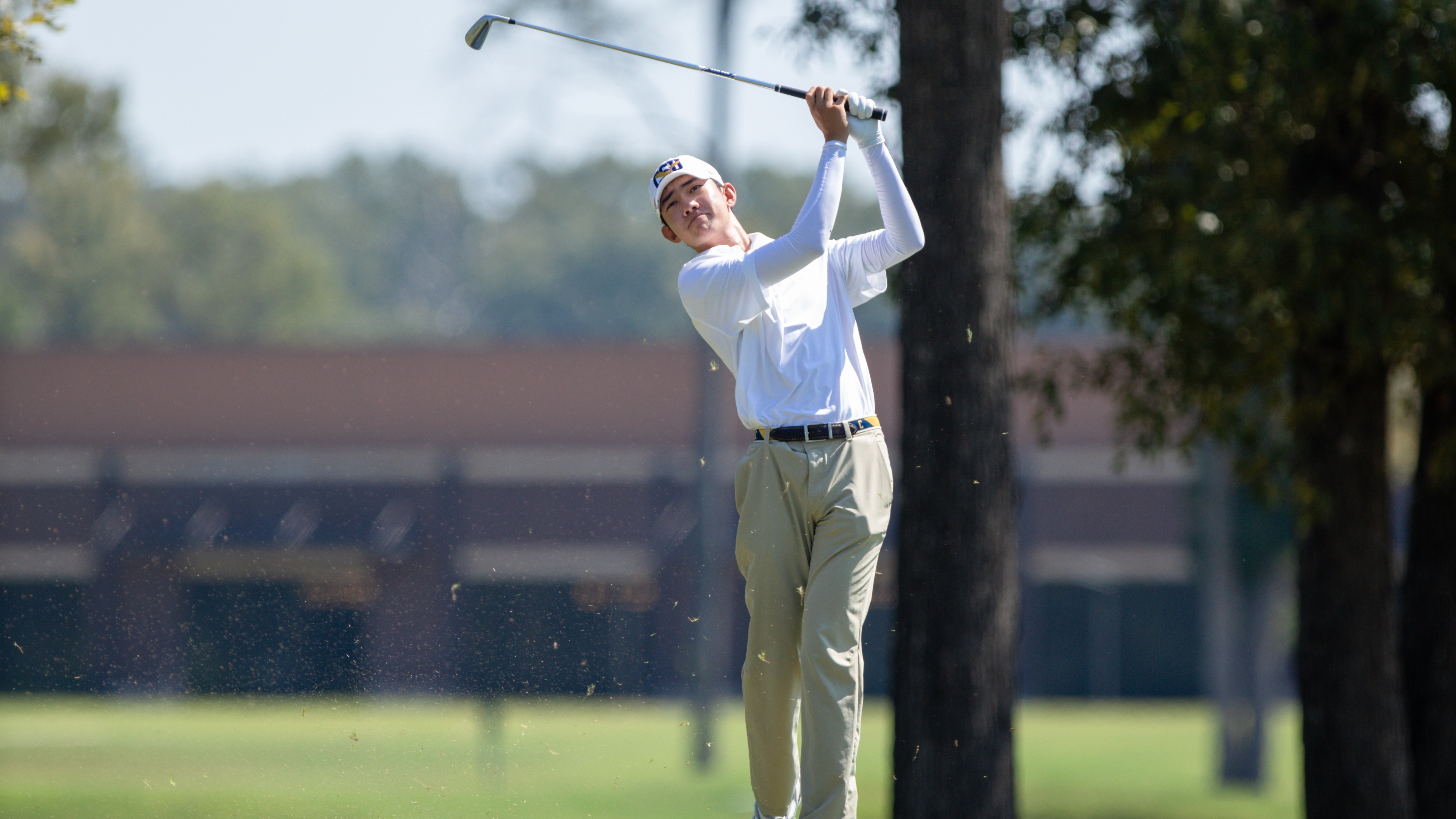 Brent Chung looks on after his approach shot to the green