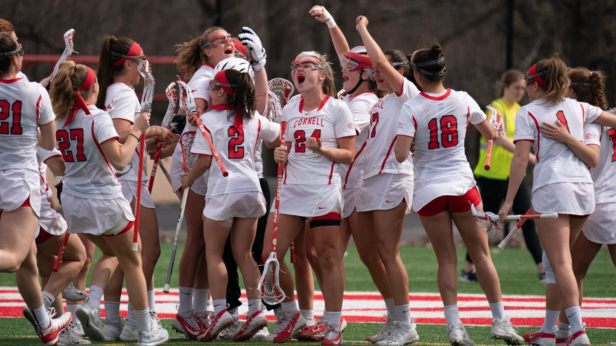 The Cornell women's lacrosse team celebrates a goal during a game against Brown on Schoellkopf Field in Ithaca, NY on Saturday, April 13, 2019.