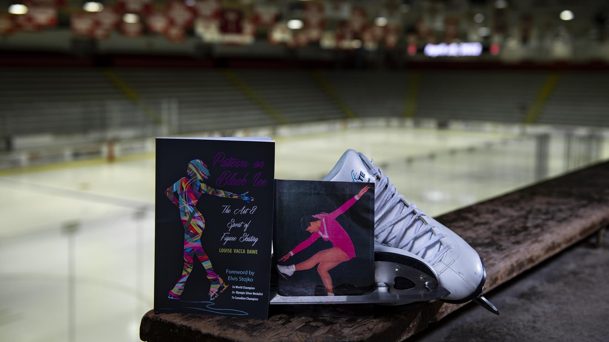 Feature photo of the book, “Patterns on Black Ice - The Art & Sport of Figure Skating”, by Louise Vacca Dawe. Dawe is a Cornell alumnae who’s accolades include being a three-time world champion, a two-time Olympic silver medalist and a seven-time Canadian champion. Photo taken in section A of Lynah Rink on Thursday, April 28, 2022.