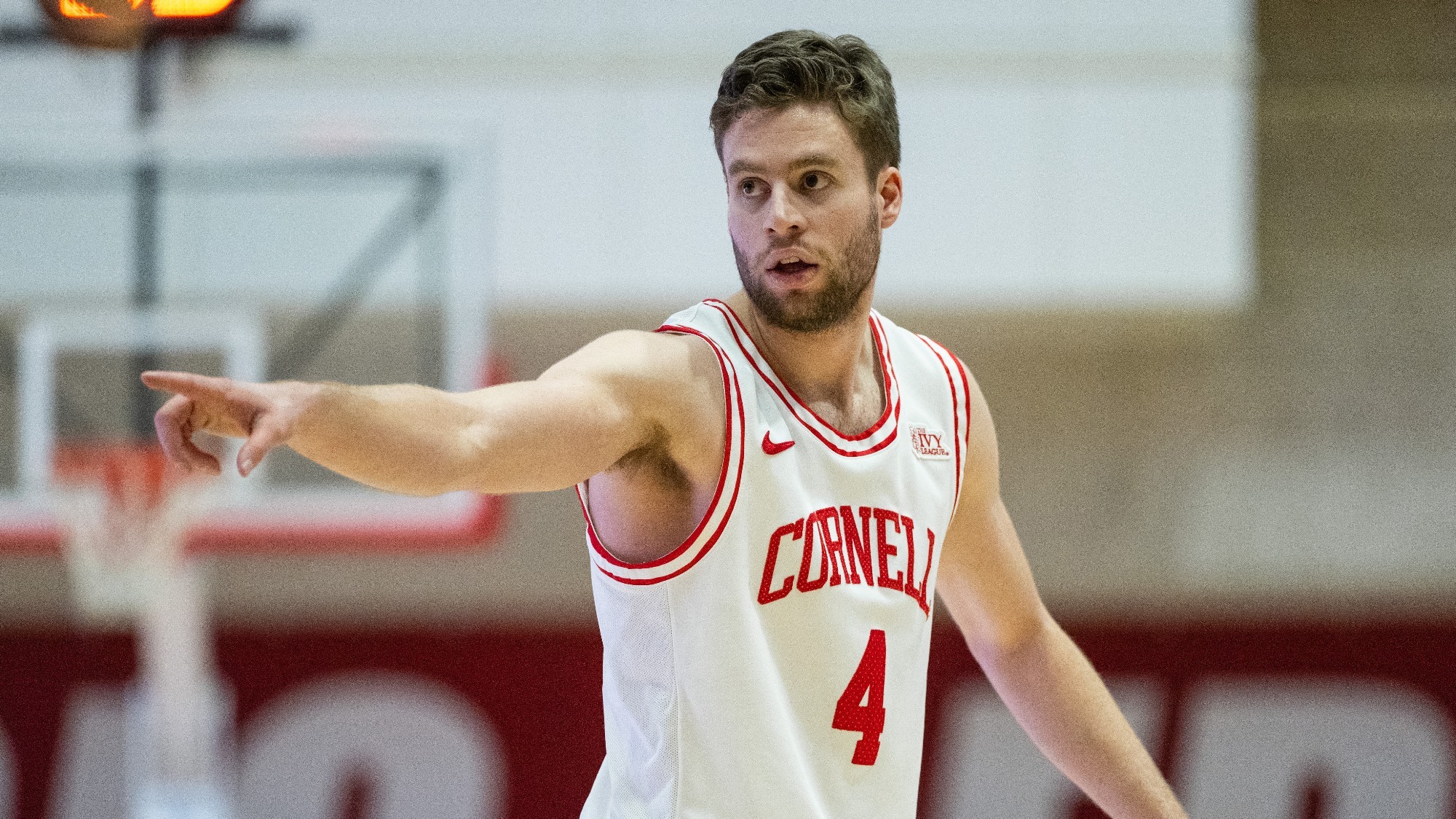Greg Dolan of the Cornell Big Red men’s basketball team points to a teammate after assisting on a basket against Yale on Friday, Jan. 13, 2023 in Newman Arena in Ithaca, NY.