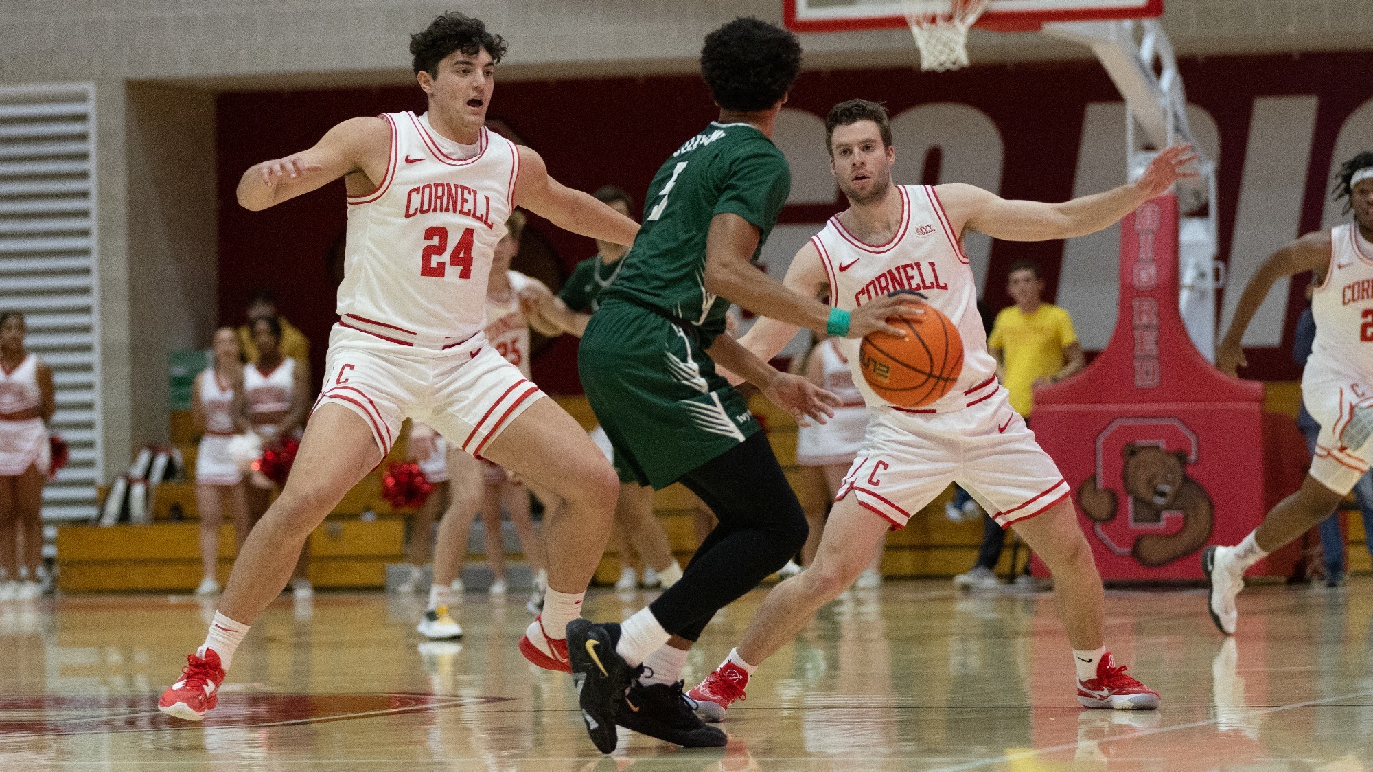 Josh Baldwin and Greg Dolan trap a Dartmouth player during the Cornell men's basketball team's 95-83 overtime win over Dartmouth on Friday, Feb. 17, 2023 at Newman Arena in Ithaca, N.Y.