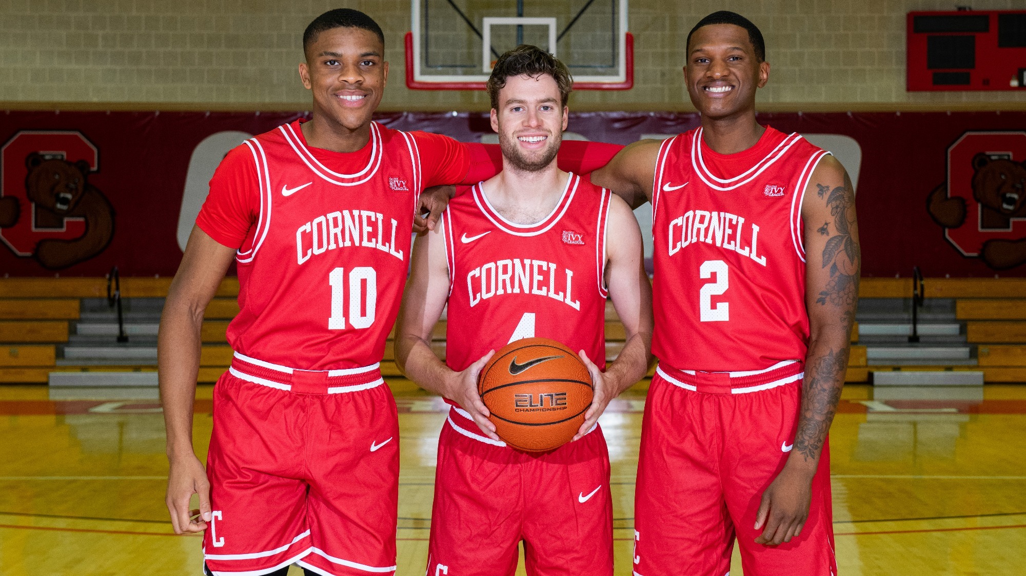 The Cornell men's basketball seniors - Chuks Uzoka, Greg Dolan and Marcus Filien - pose for a photo on Tuesday, Sept. 27, 2022 in Newman Arena in Ithaca, NY.