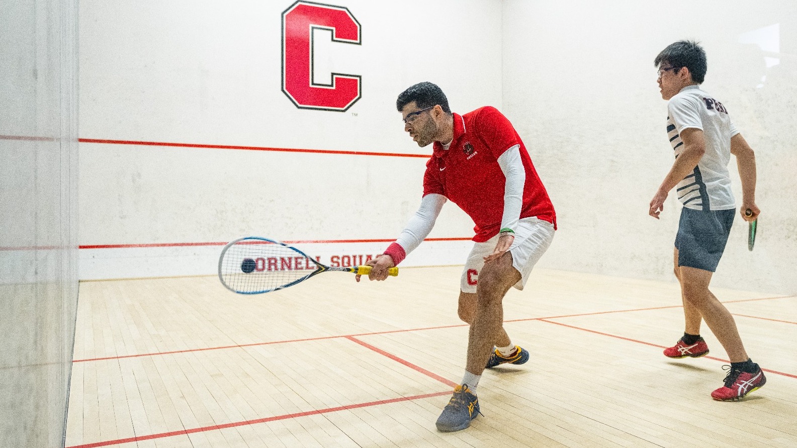 Veer Chotrani goes to hit a squash ball against Penn on Jan. 13, 2023.