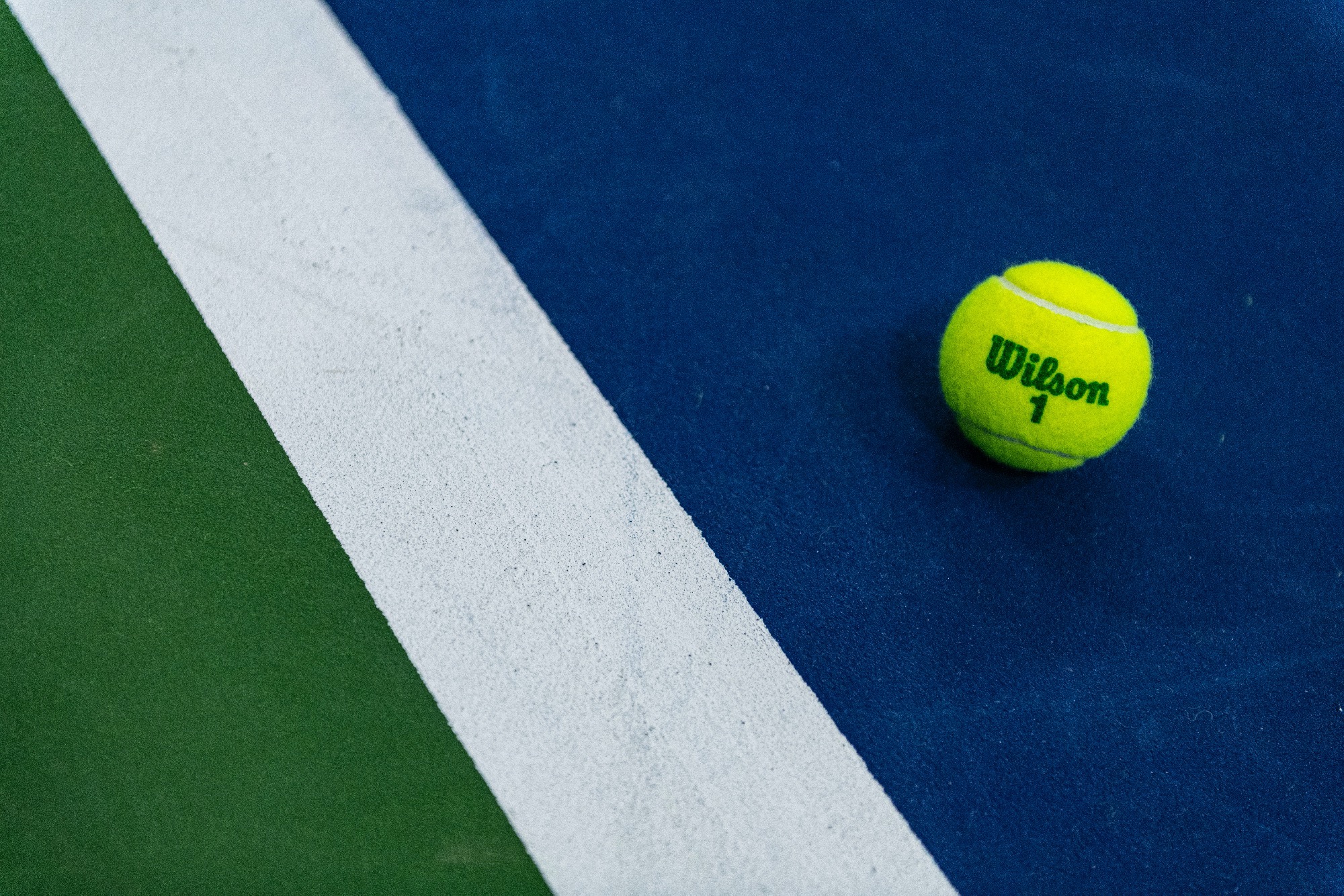 Tennis Ball on Court 