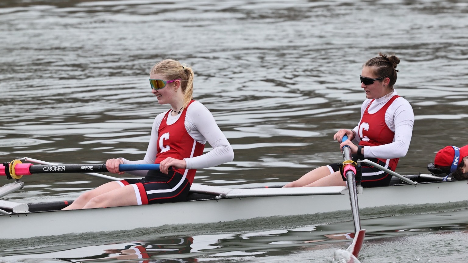 Cornell women's rowers Cedar Wink and Maggie Huggins compete against Colgate and Boston University on the Cayuga Inlet in Ithaca, N.Y., on March 29, 2025.