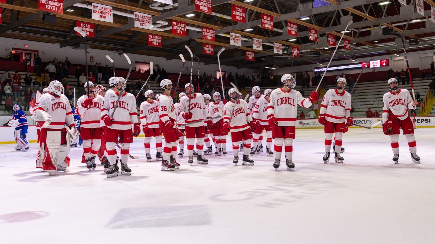 Members of the Cornell men's hockey team salute the Lynah Faithful after its exhibition against the U.S. NTDP Under-18 Team on Oct. 25, 2025, at Lynah Rink in Ithaca, N.Y.