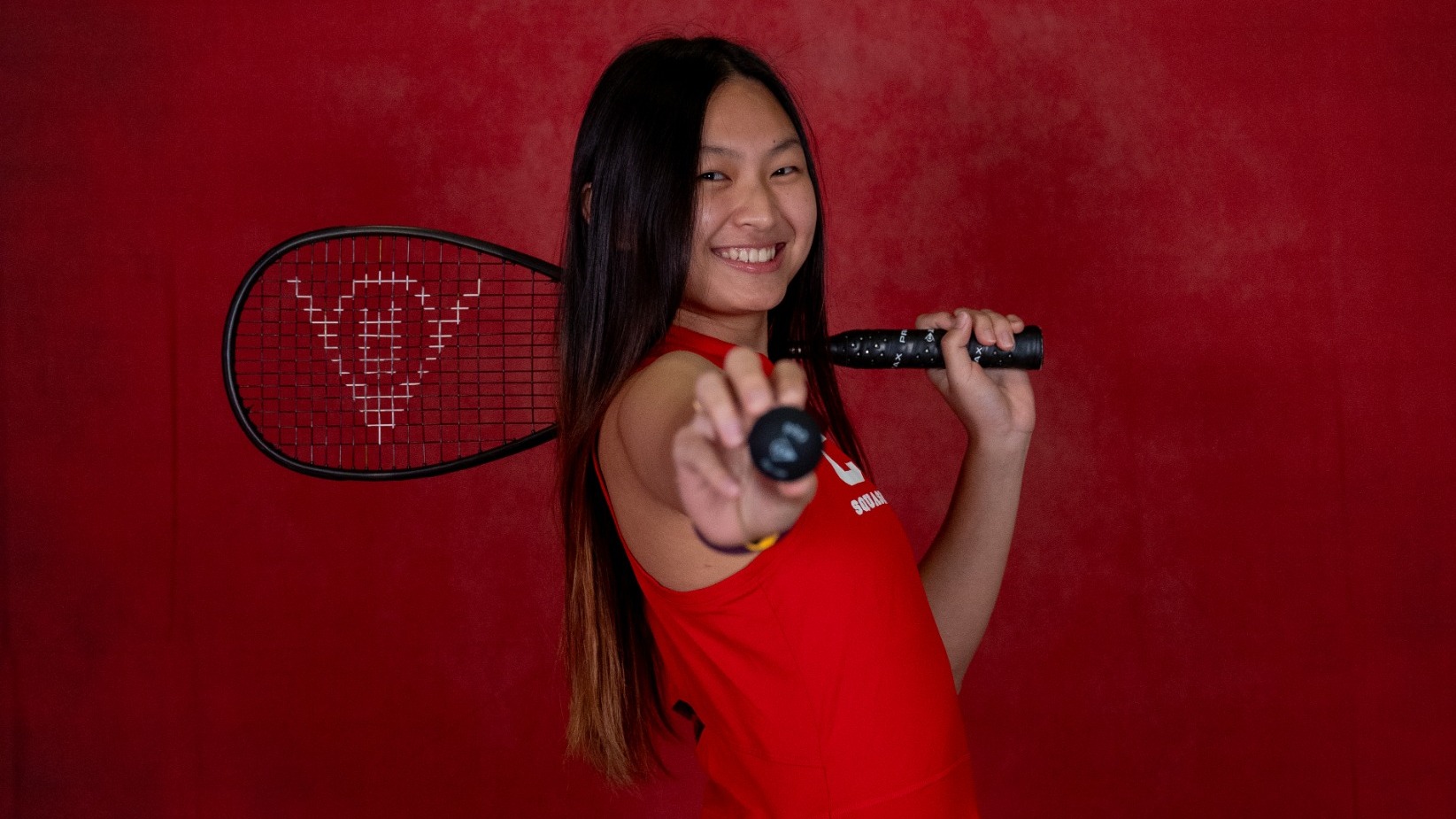 Cornell women's squash player Xin Ying Yee poses for a media day photo during the 2024-25 season.