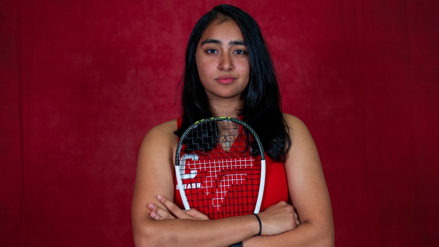 Cornell women's squash player Aishwarya Khubchandani poses for a media day photo before the 2024-25 season.