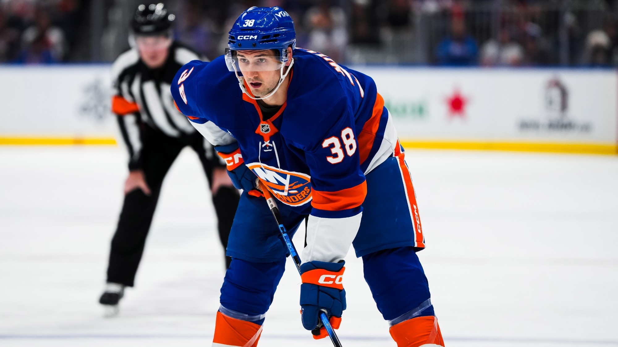 New York Islanders and former Cornell men's hockey defenseman Travis Mitchell '23 waits for a faceoff during game action against the Philadelphia Flyers on Nov. 28, 2025, at UBS Arena in New York.