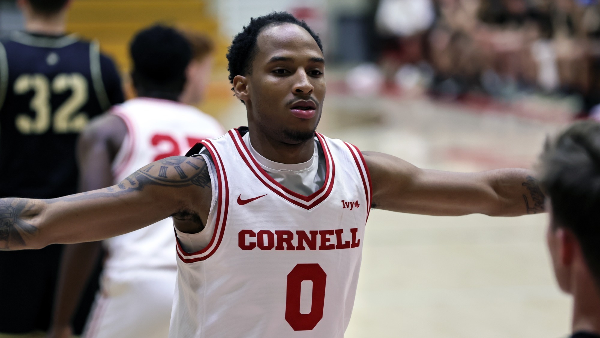 Junior DaMaryon Fishburn defends an inbounds pass during the Big Red's win over Army West Point at Newman Arena in Ithaca, N.Y.