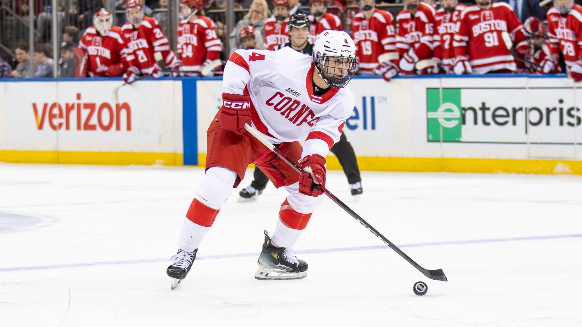 Cornell men's hockey freshman defenseman Xavier Veilleux looks to find an open teammate during Red Hot Hockey against Boston University at Madison Square Garden in New York City on Nov. 29, 2025.