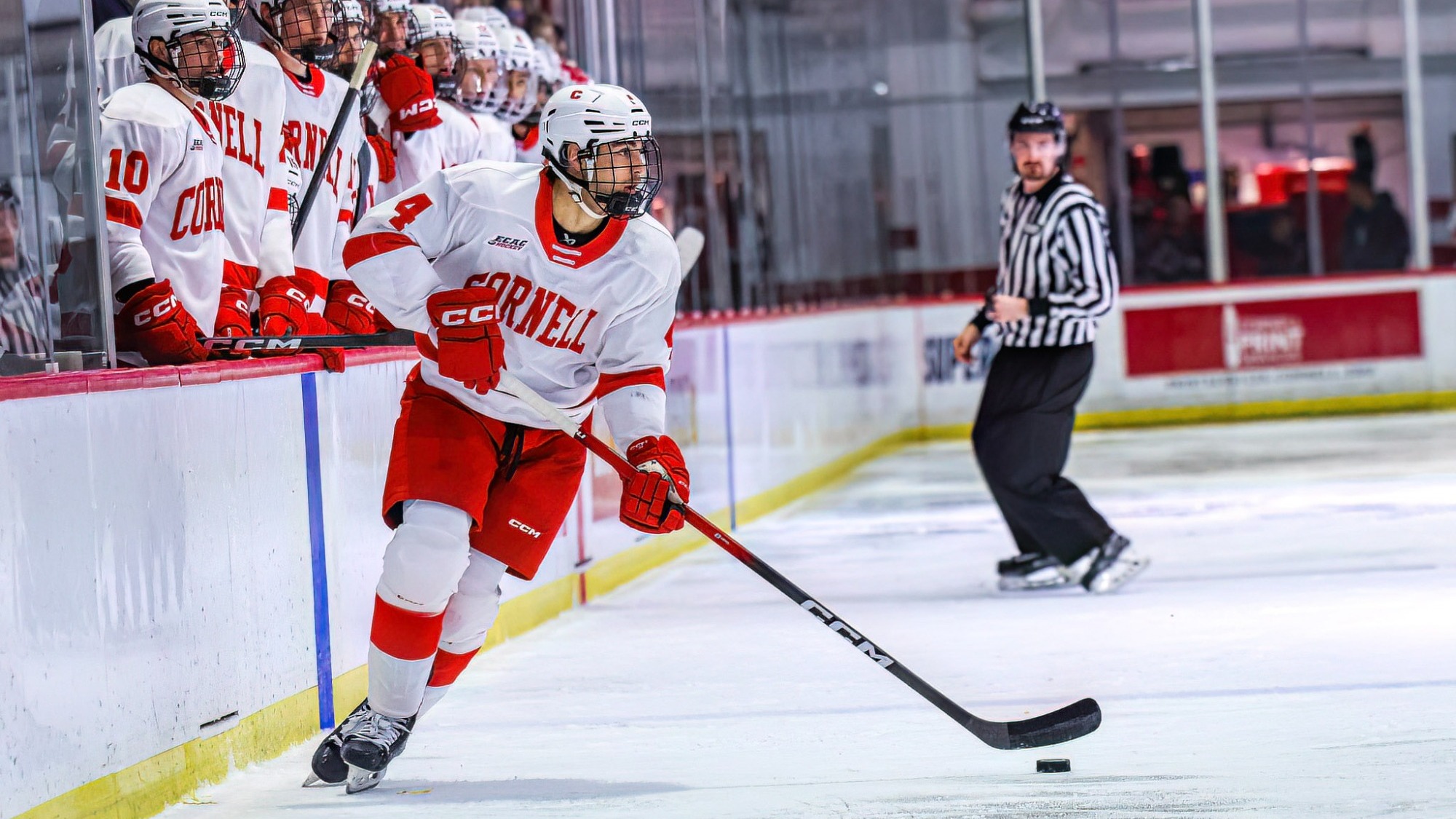 Cornell men's hockey freshman defenseman Xavier Veilleux carries the puck into the offensive zone during game action against RPI on Nov. 22, 2025, at Lynah Rink in Ithaca, N.Y.