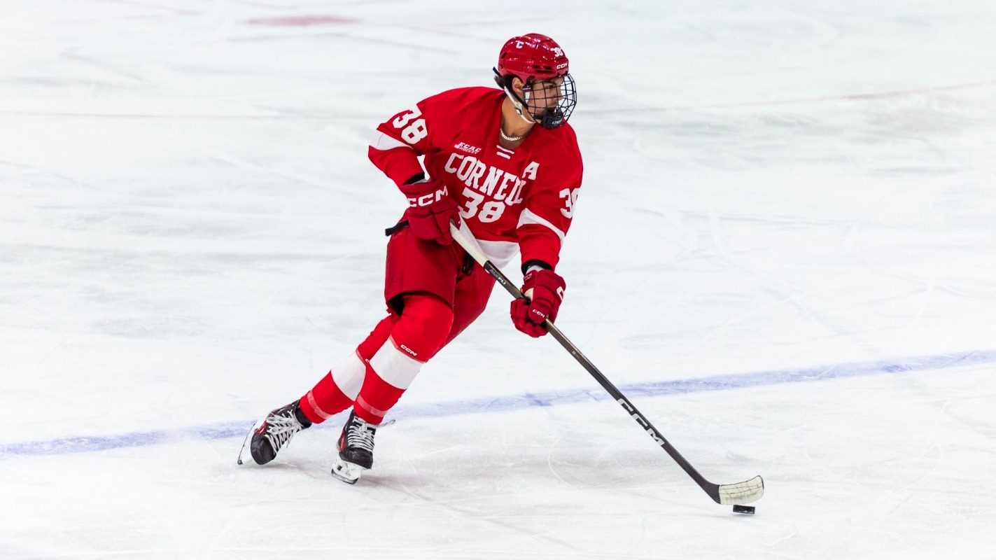 Cornell men's hockey junior forward Jonathan Castagna carries the puck up ice against Harvard at the Bright-Landry Hockey Center in Cambridge, Mass., on Nov. 7, 2025.