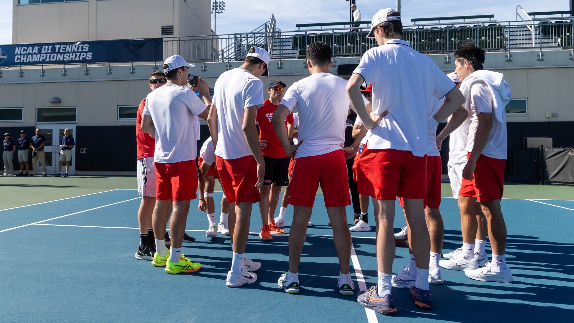 The Cornell men's tennis team competes against Michigan during the 2024-25 NCAA Tournament at Texas.