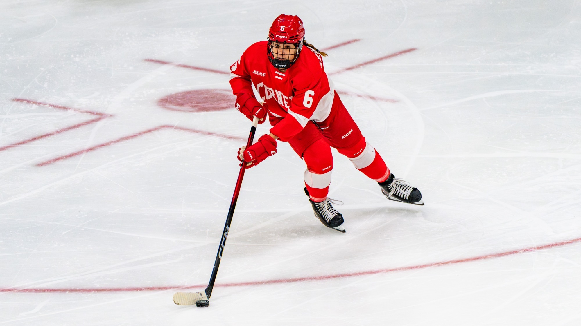 Regalado skates with the puck.