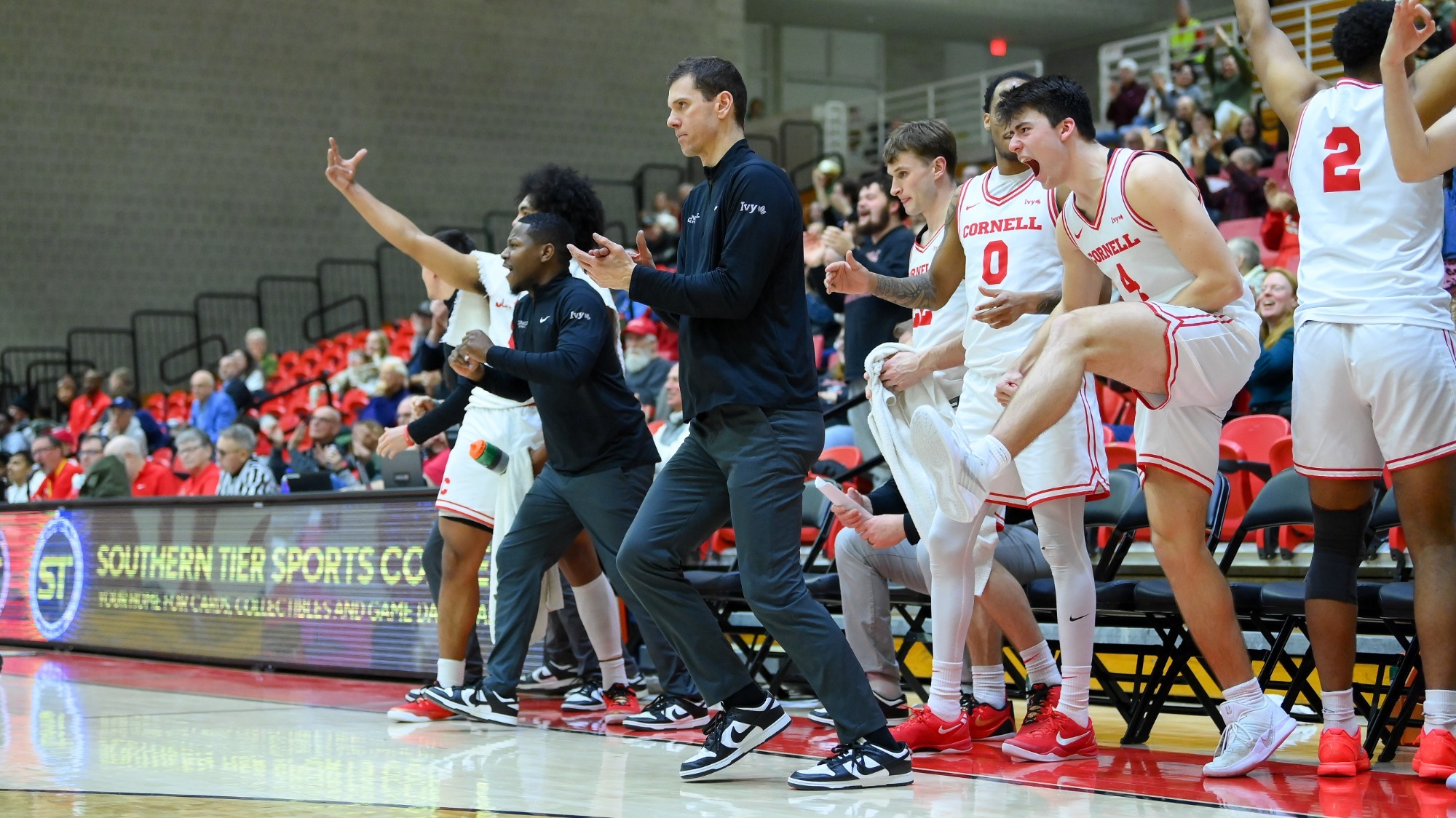 The Cornell bench comes alive during a 104-99 loss at Columbia on Jan. 6, 2026 at Newman Arena in Ithaca, N.Y.