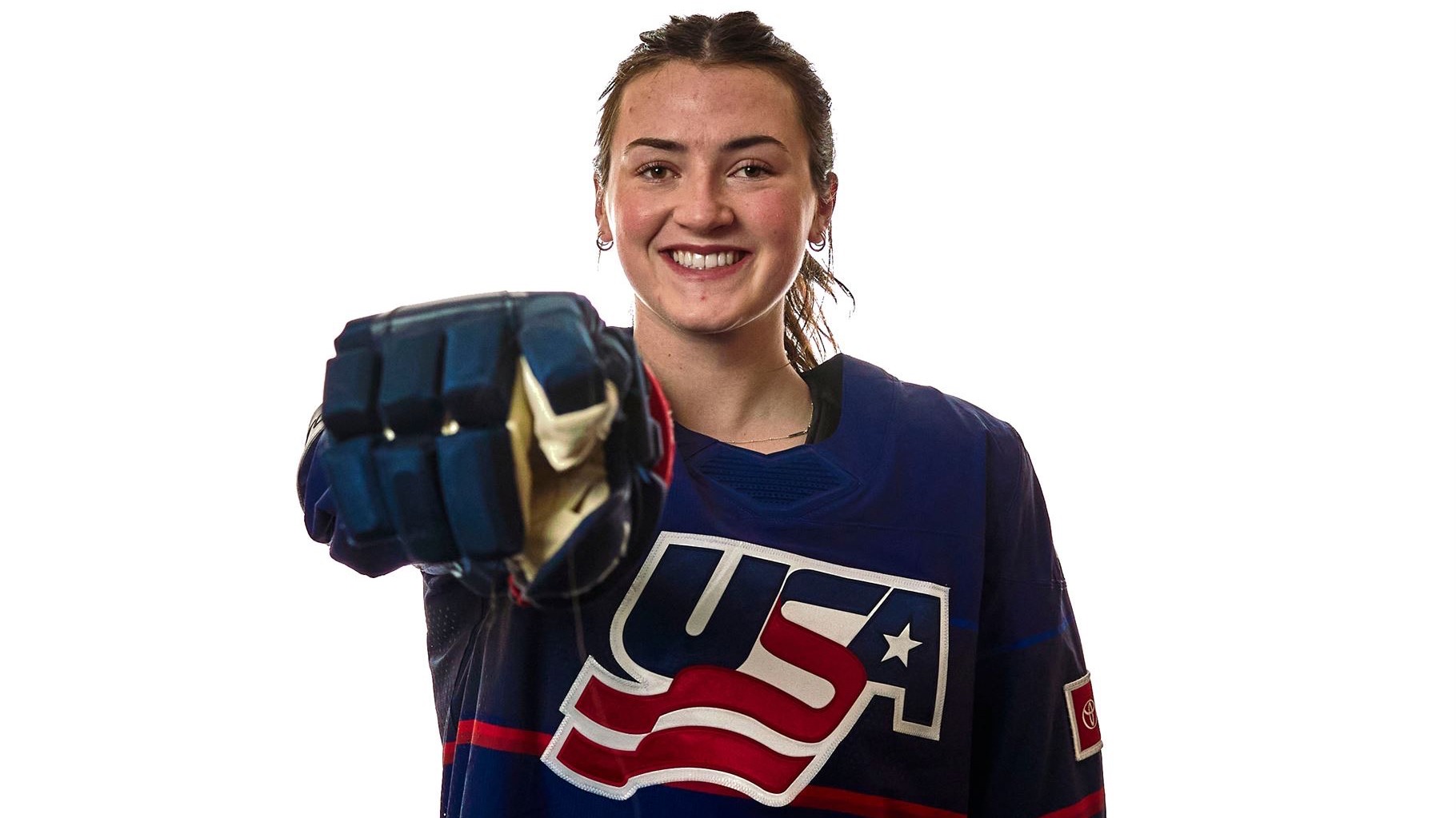 Guilday points at the camera during USA Hockey Media Day 2024