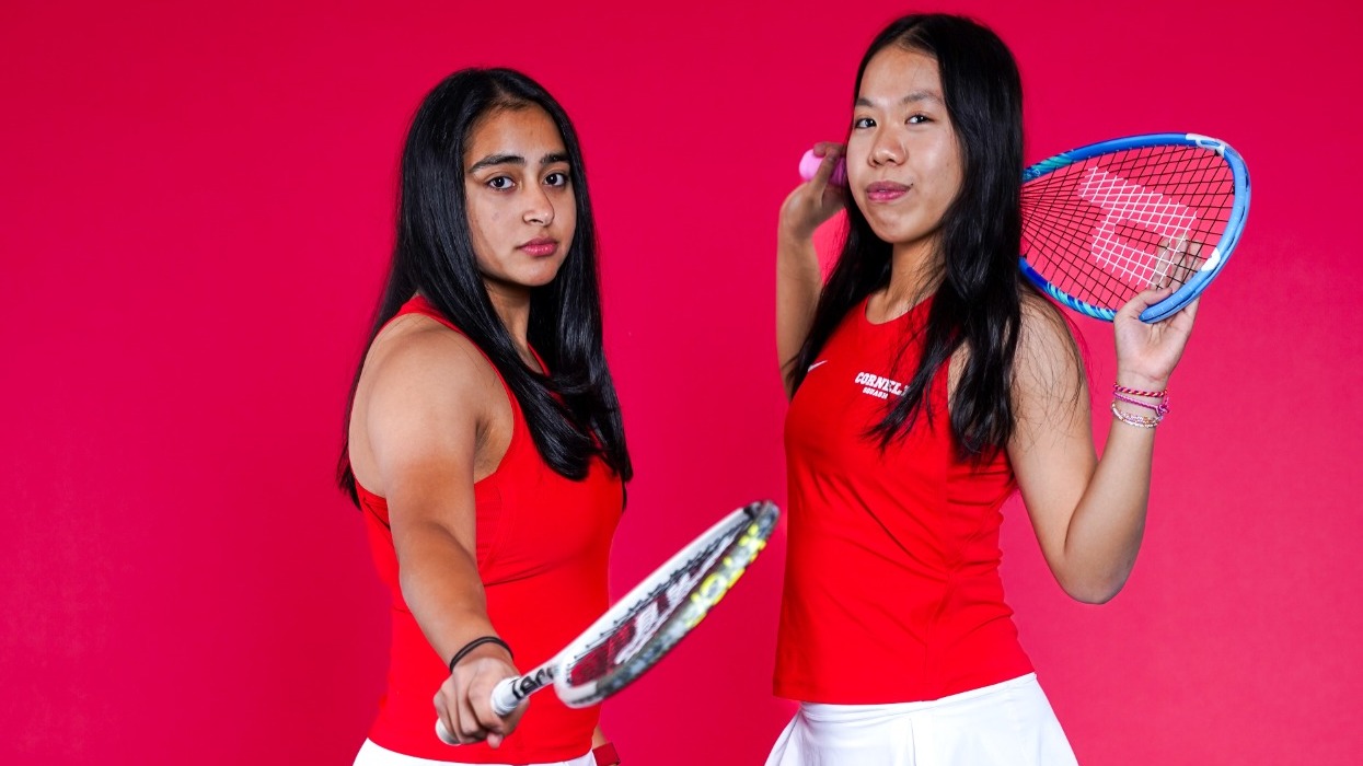 Cornell women's squash players Aishwarya Khubchandani and Vicky Lai pose for media day photos before the 2025-26 season.