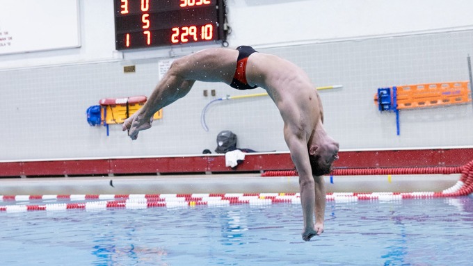 Men's swimming and diving competes at Teagle Pool.
