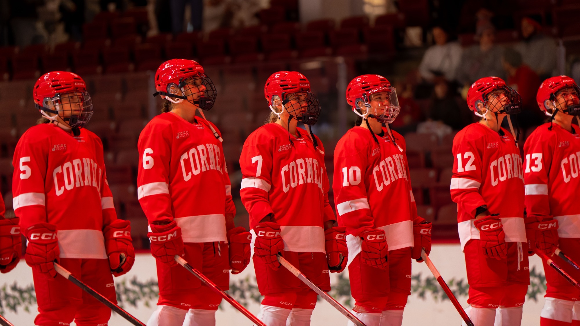 Women's ice hockey during opponent introductions at Bright-Landry Rink.