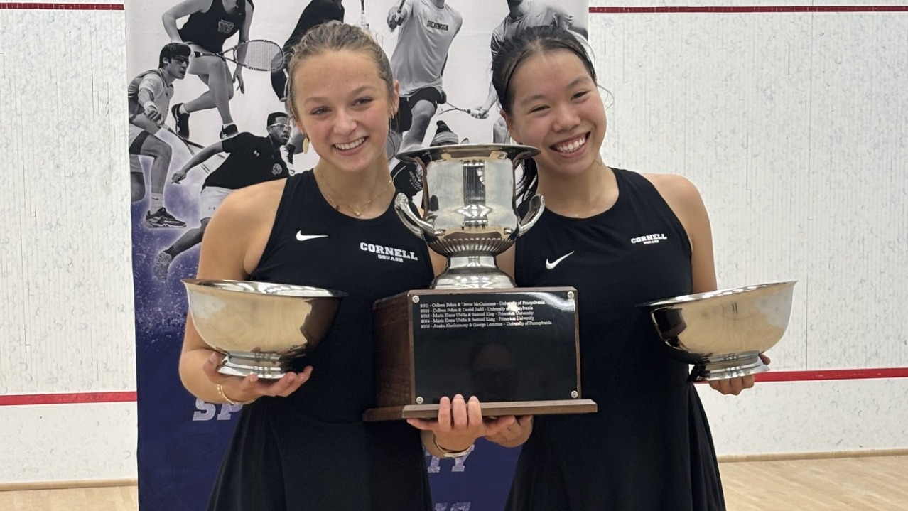Cornell women's squash players Eloise Levin (left) and Vicky Lai stand with trophies after winning the 2027 U.S. Intercollegiate Doubles Women's Open Draw at the Cynwyd Club in Bala Cynwyd, Pa., on Oct. 11, 2026.