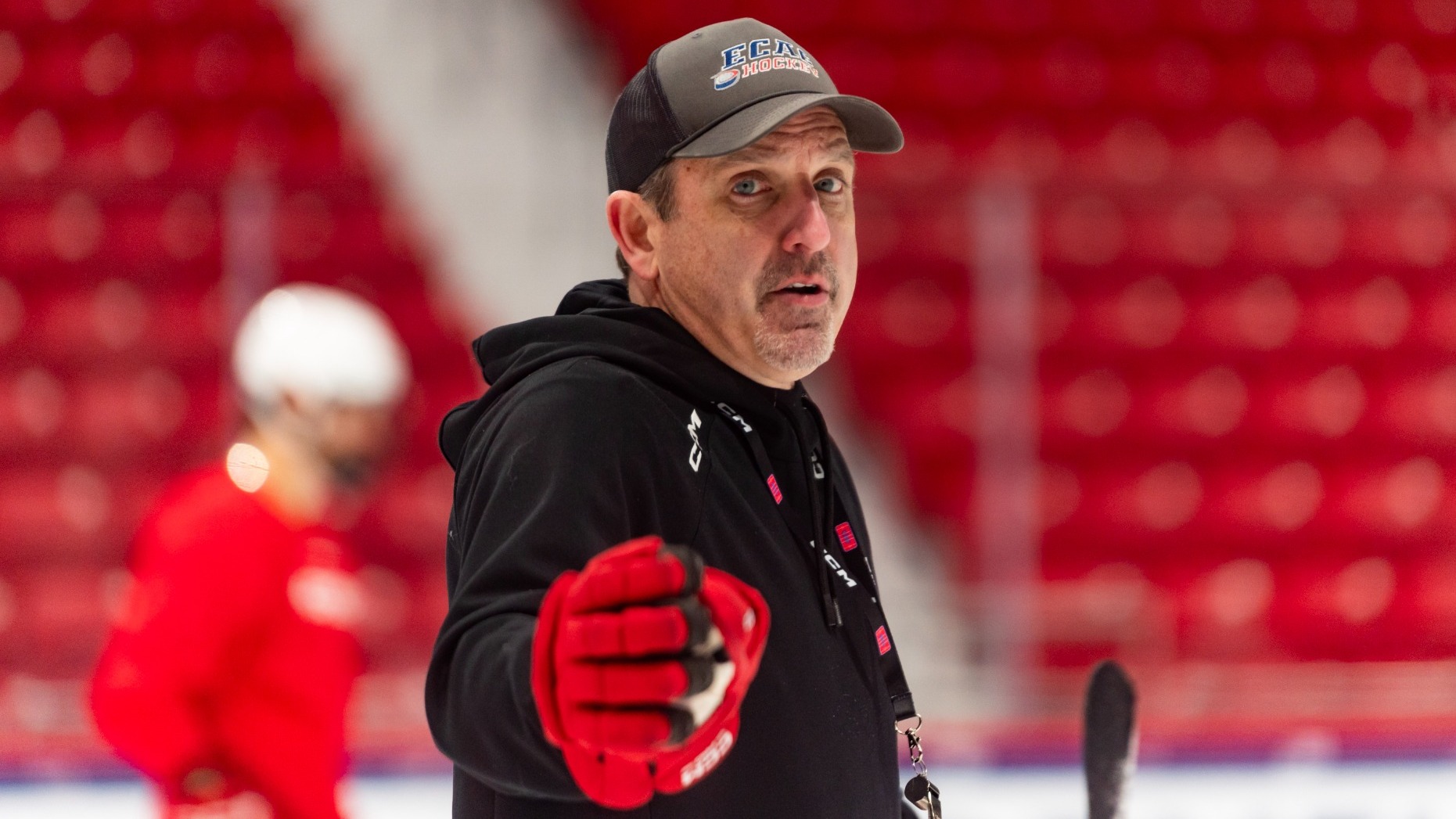 Casey Jones '90, the Jay R. Bloom '77 Head Coach of Cornell Men's Ice Hockey, directs his team during a practice at the 1980 Rink — Herb Brooks Arena in Lake Placid, N.Y., on March 19, 2026.