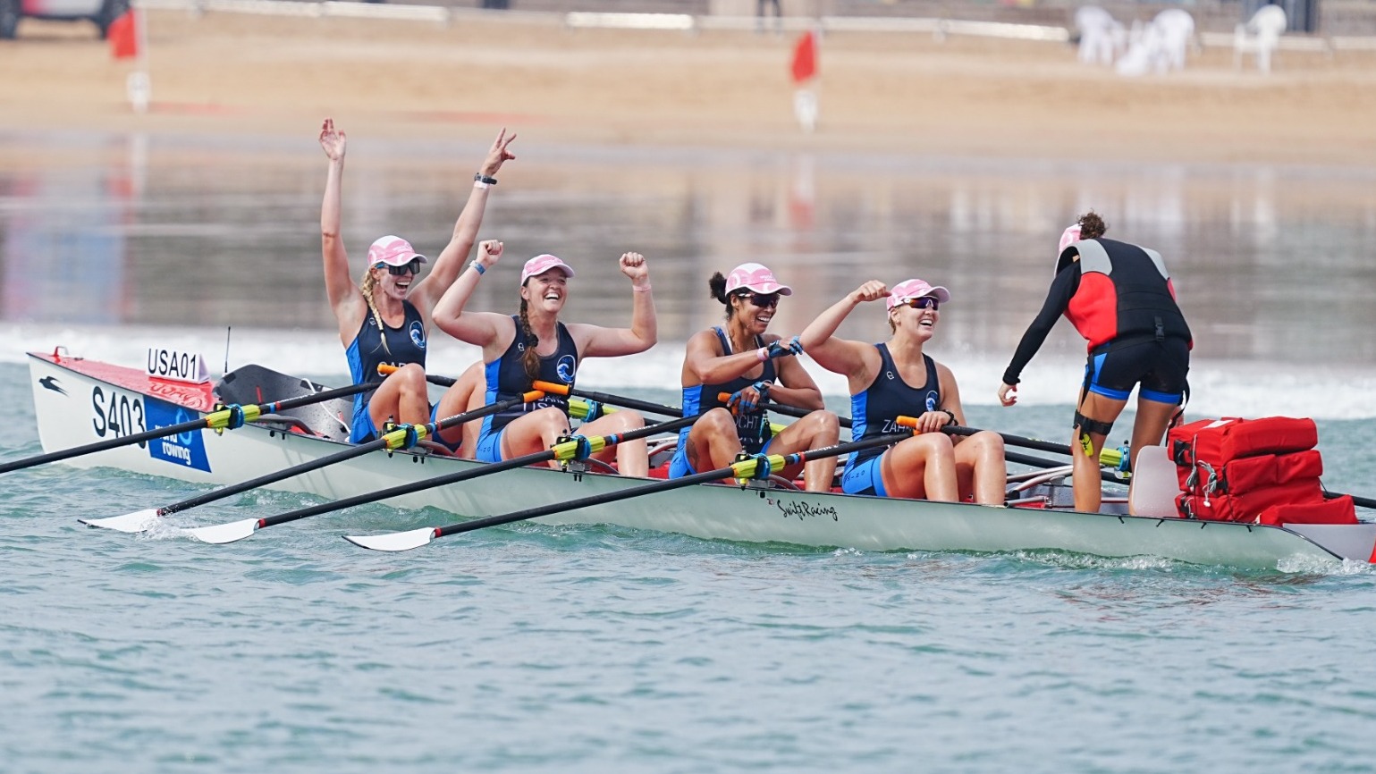Former Cornell women's rower Solveig Imsdahl '13 celebrates with her teammates after winning gold at the 2026 World Rowing Coastal Championships in Qingdao, China, on Oct. 13, 2026.