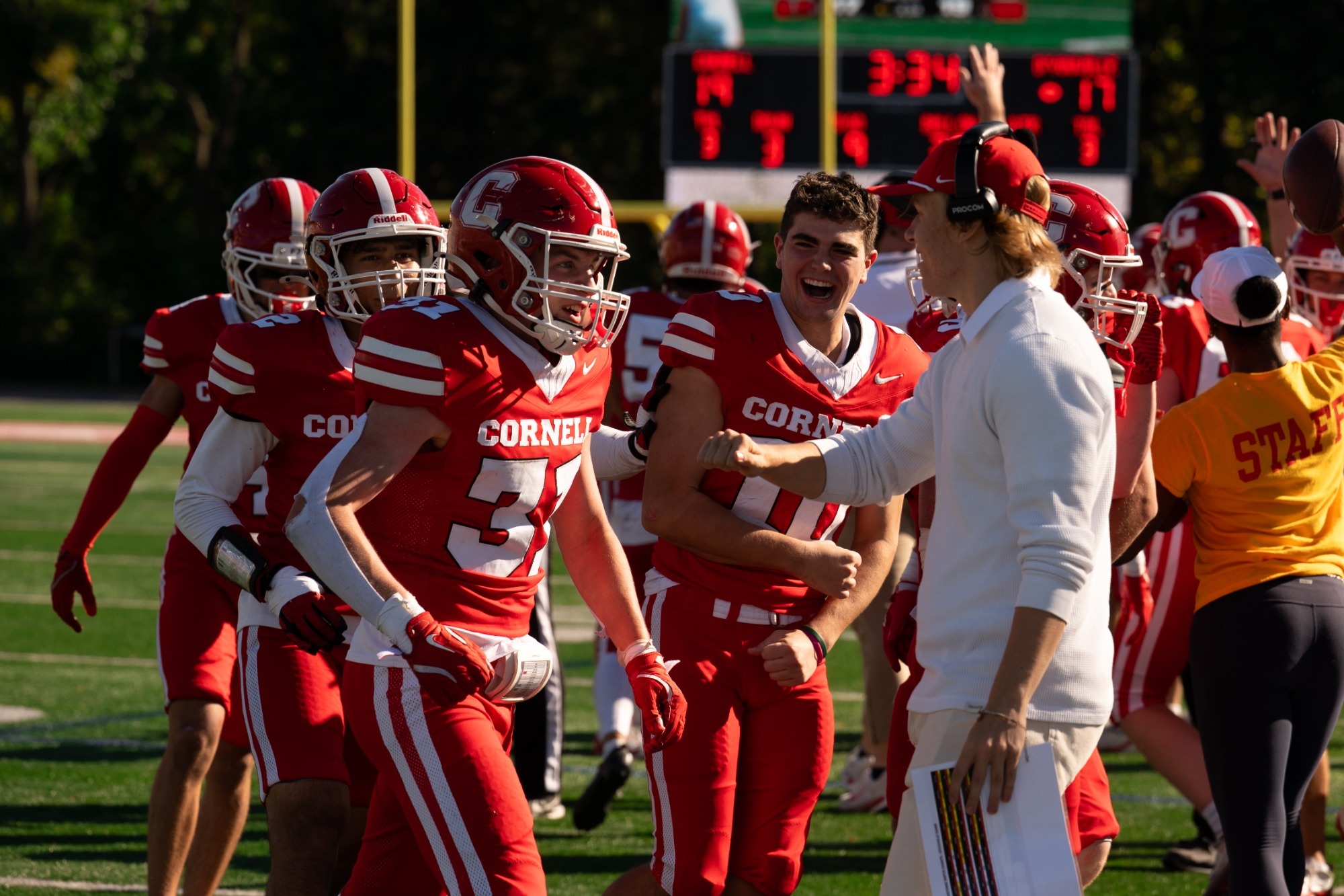 Jason Milo celebrates on the sideline