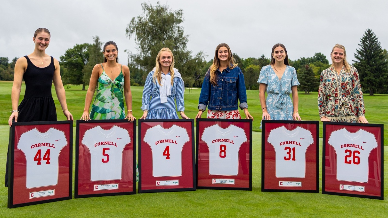 2026 Women's Lacrosse Seniors at End of Year Banquet on Moakley Course