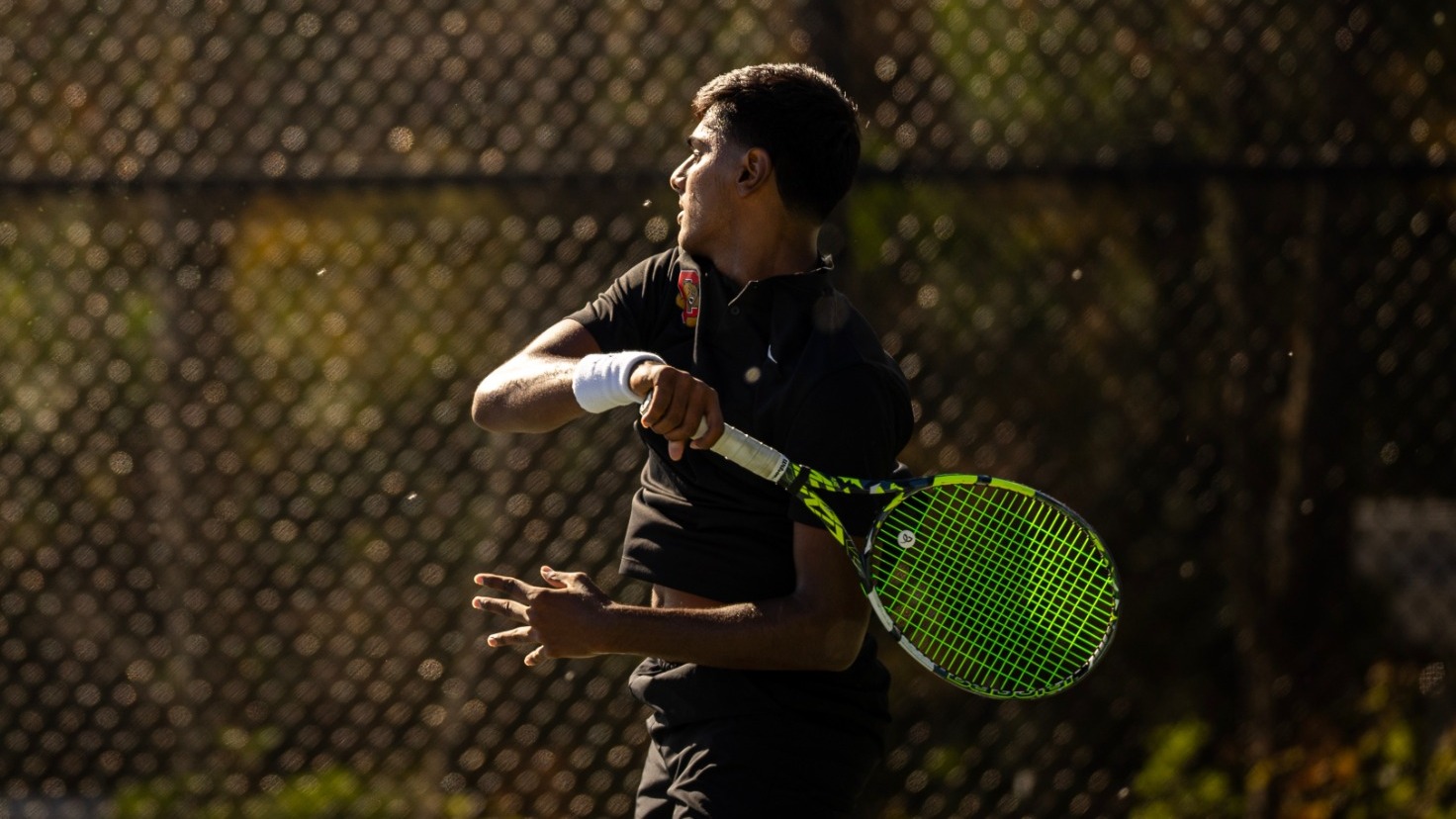 Rushil Pranav Senthil Kumar follows through on a shot during match action at the ITA New England Regional, hosted by Harvard University. 