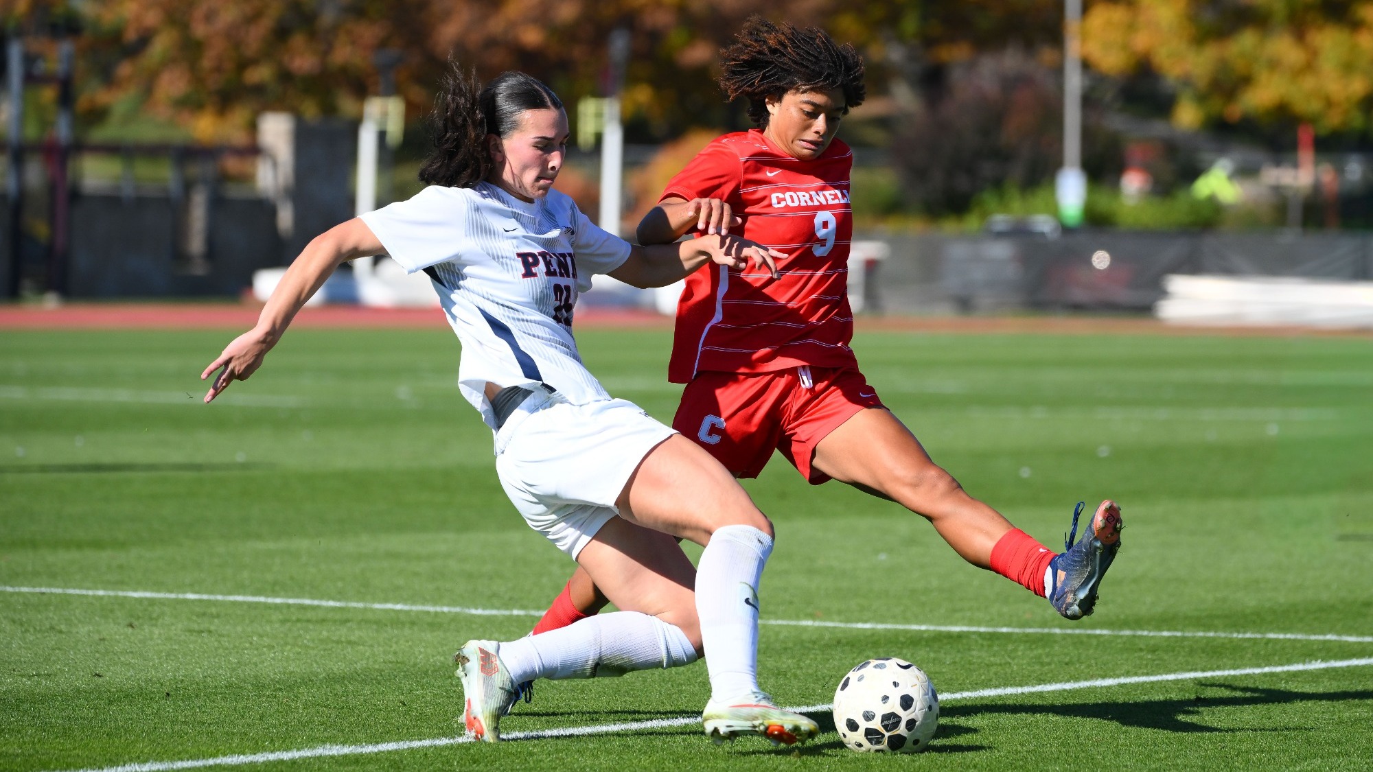 Cornell women's soccer senior forward Alanna Colbert battles with a Penn defender for the ball during match action on Oct. 24, 2026, at Berman Field in Ithaca, N.Y.